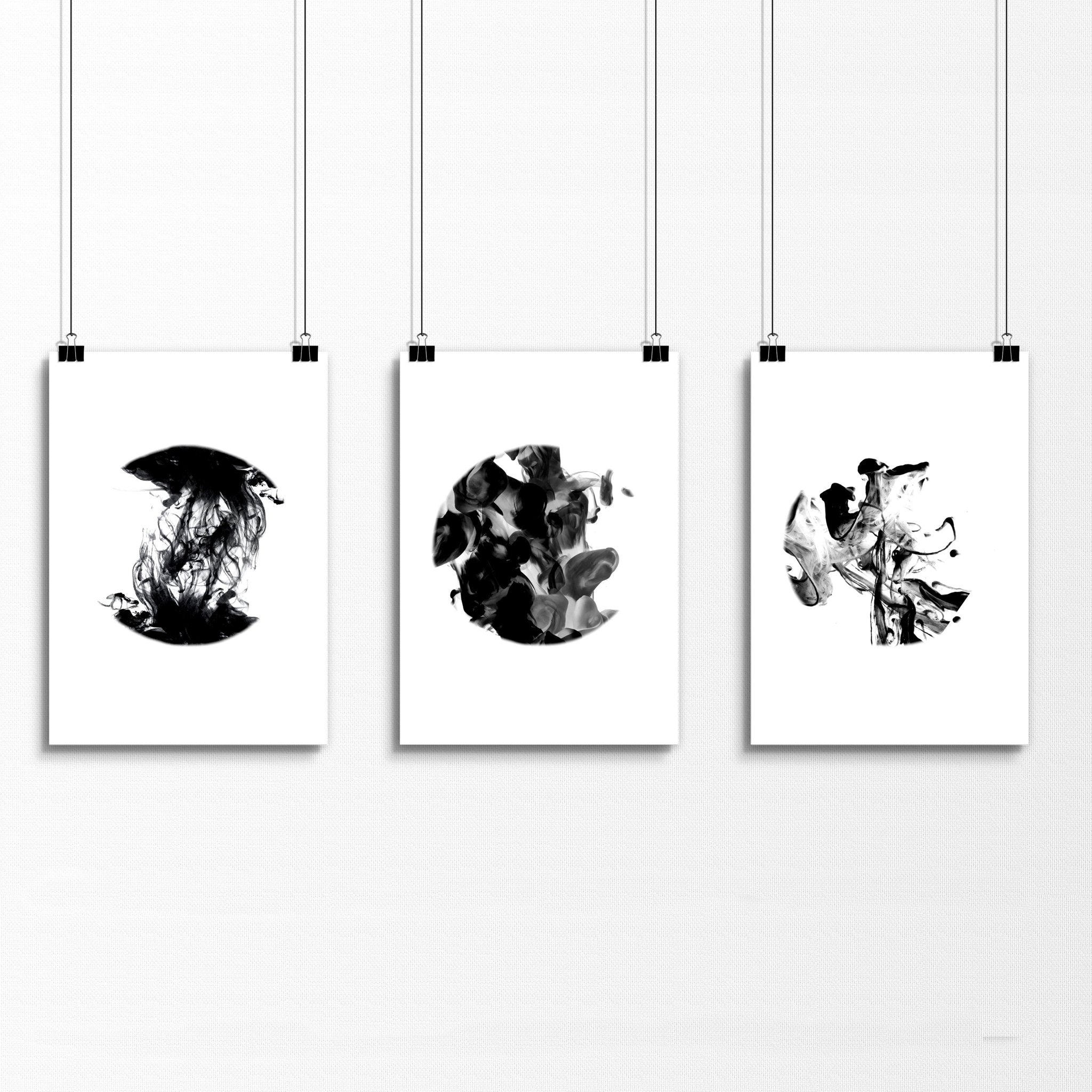 Set of 3 minimalistic wall art prints featuring captivating monochromatic alcohol ink designs, perfect for enhancing living room decor.