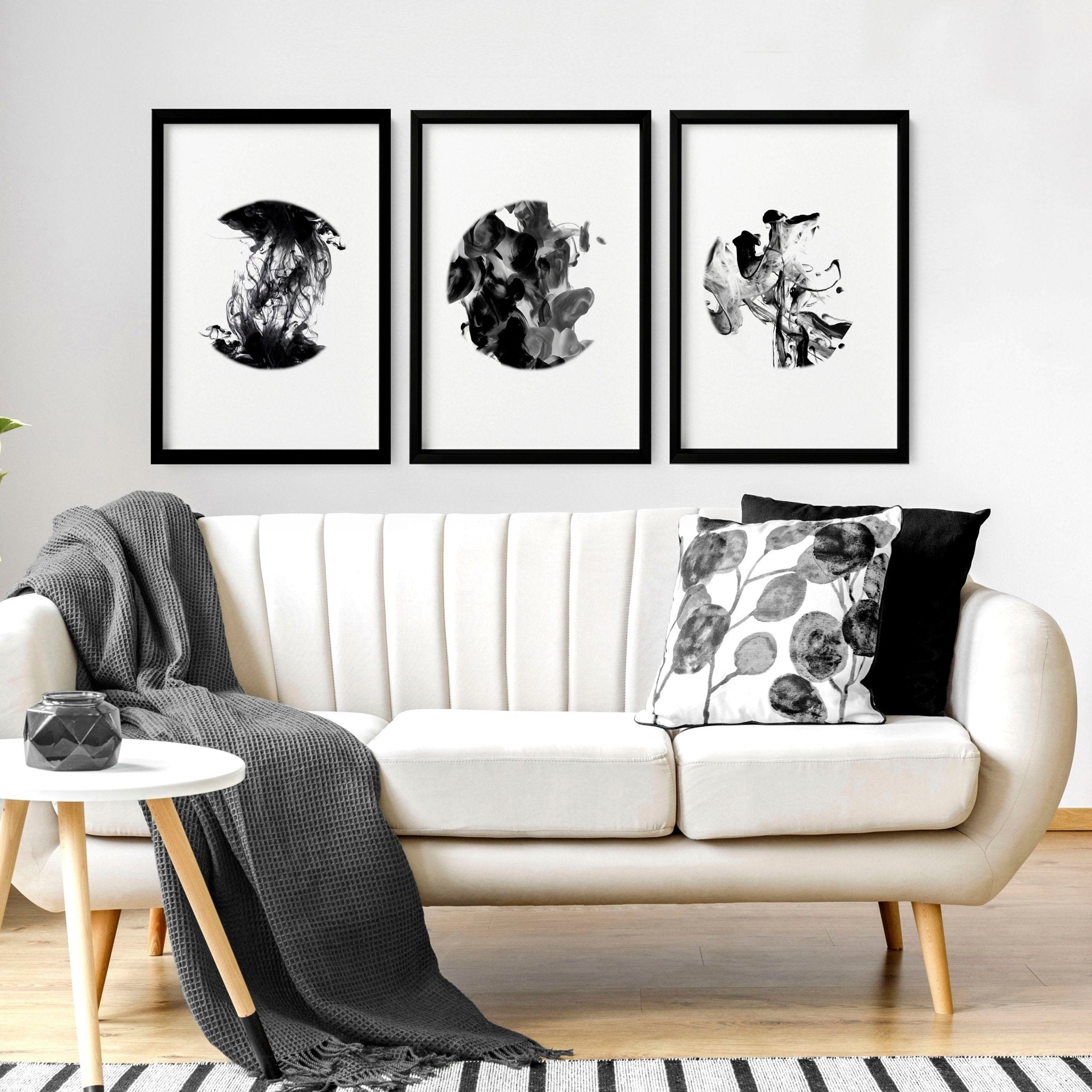 Set of 3 minimalistic wall art prints featuring captivating monochromatic alcohol ink designs, perfect for enhancing living room decor.