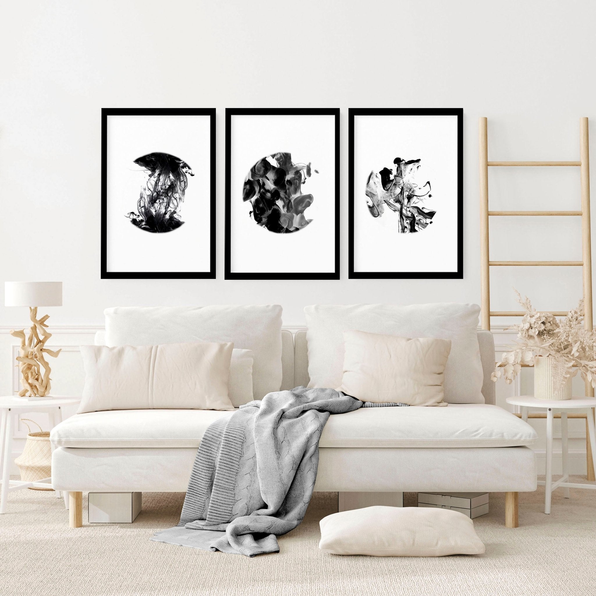 Set of 3 minimalistic wall art prints featuring captivating monochromatic alcohol ink designs, perfect for enhancing living room decor.
