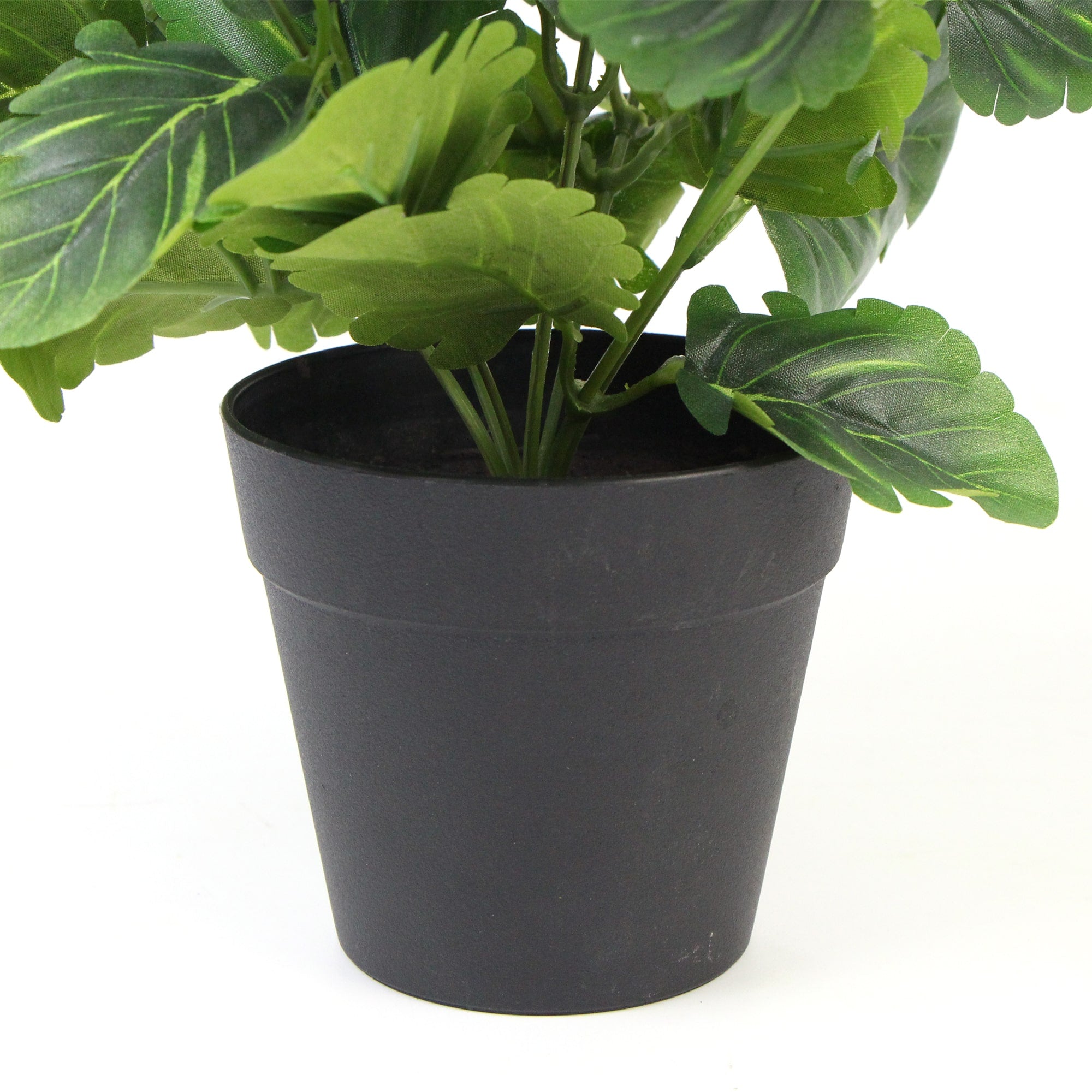 A beautiful arrangement of mixed white flowering artificial pansy plants in a decorative pot, showcasing realistic blooms and lush green leaves.