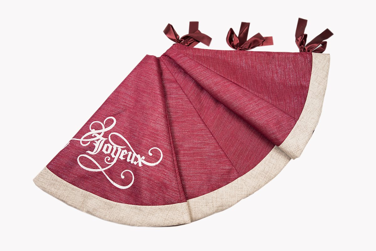 ML17125 Joyeux Christmas Tree Skirt, 56 inches round, featuring embroidered 'Joyeux' message and shimmering fabric, perfect for holiday decor.