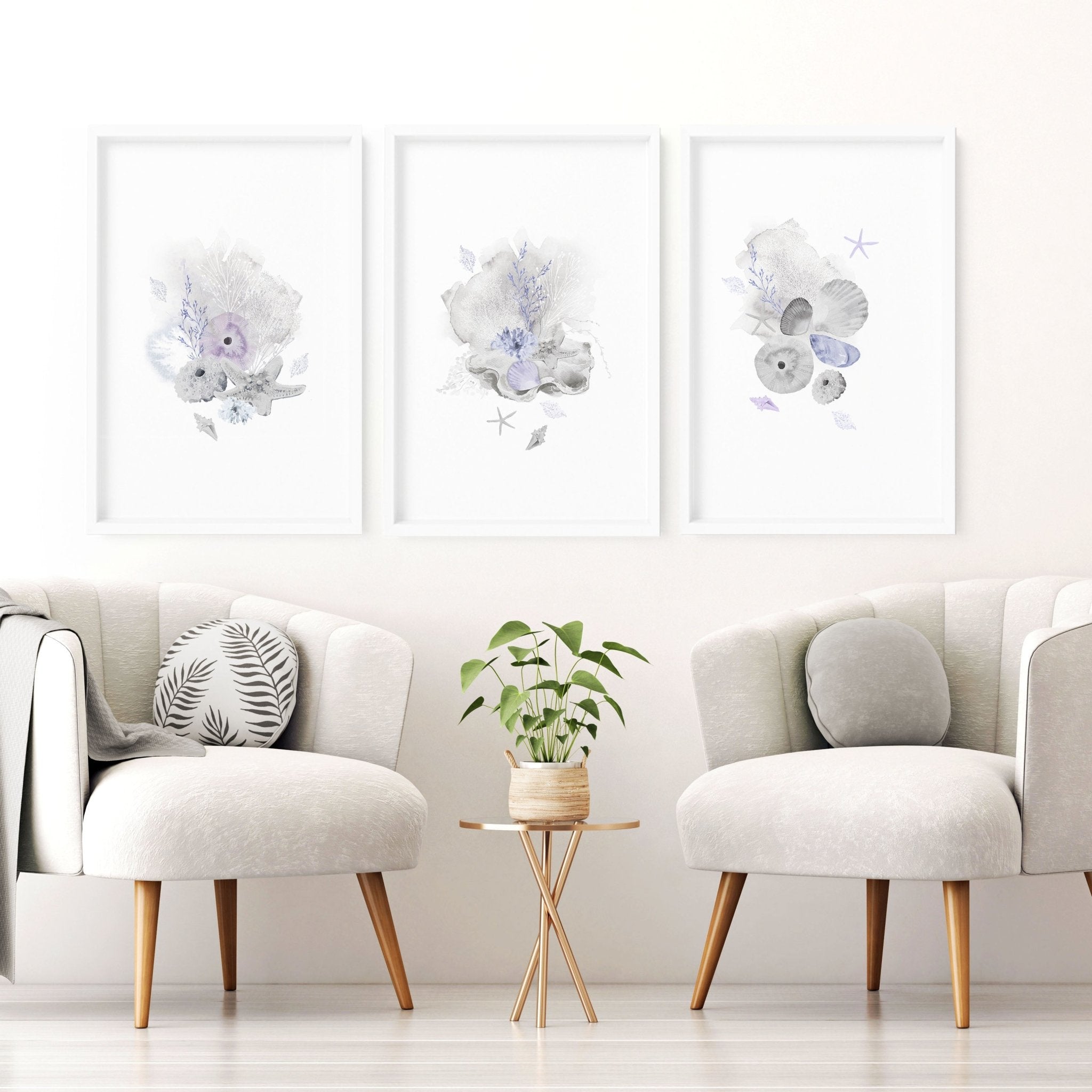 Set of 3 modern beach house wall art prints featuring coastal designs in blue and sandy beige colors, perfect for home decor.