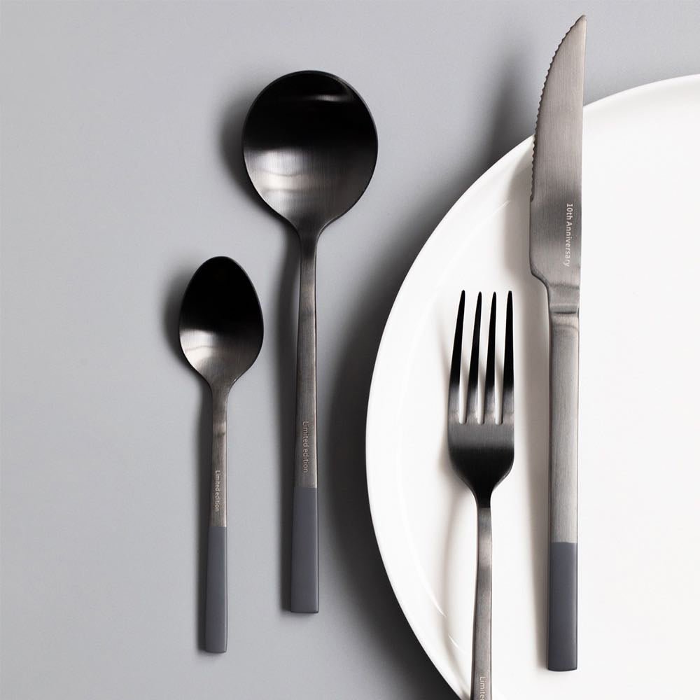 Modern Nordic Matte Black Stainless Flatware Set featuring a dinner fork, knife, spoon, and tea spoon in a sleek matte black finish.