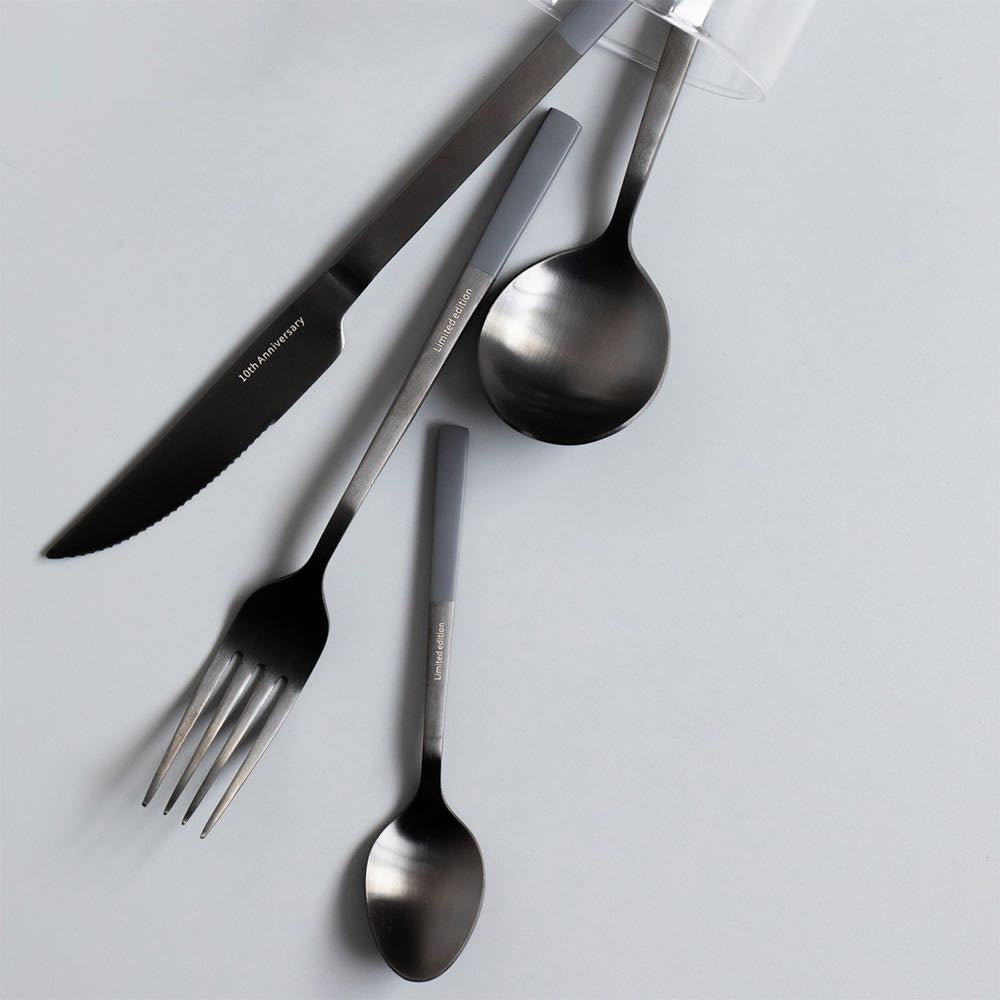 Modern Nordic Matte Black Stainless Flatware Set featuring a dinner fork, knife, spoon, and tea spoon in a sleek matte black finish.