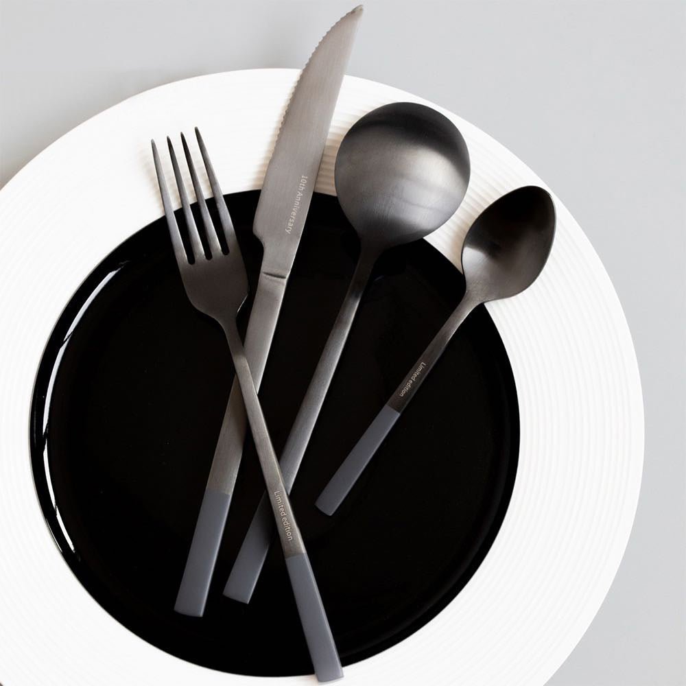 Modern Nordic Matte Black Stainless Flatware Set featuring a dinner fork, knife, spoon, and tea spoon in a sleek matte black finish.