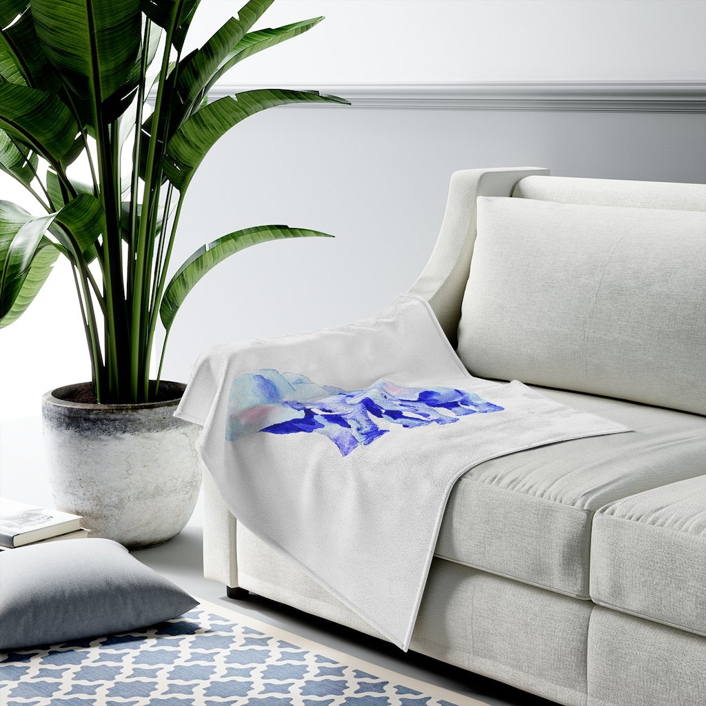 A cozy Mother and Baby Auspicious Elephant velveteen plush blanket featuring a charming elephant design, perfect for home decor and comfort.