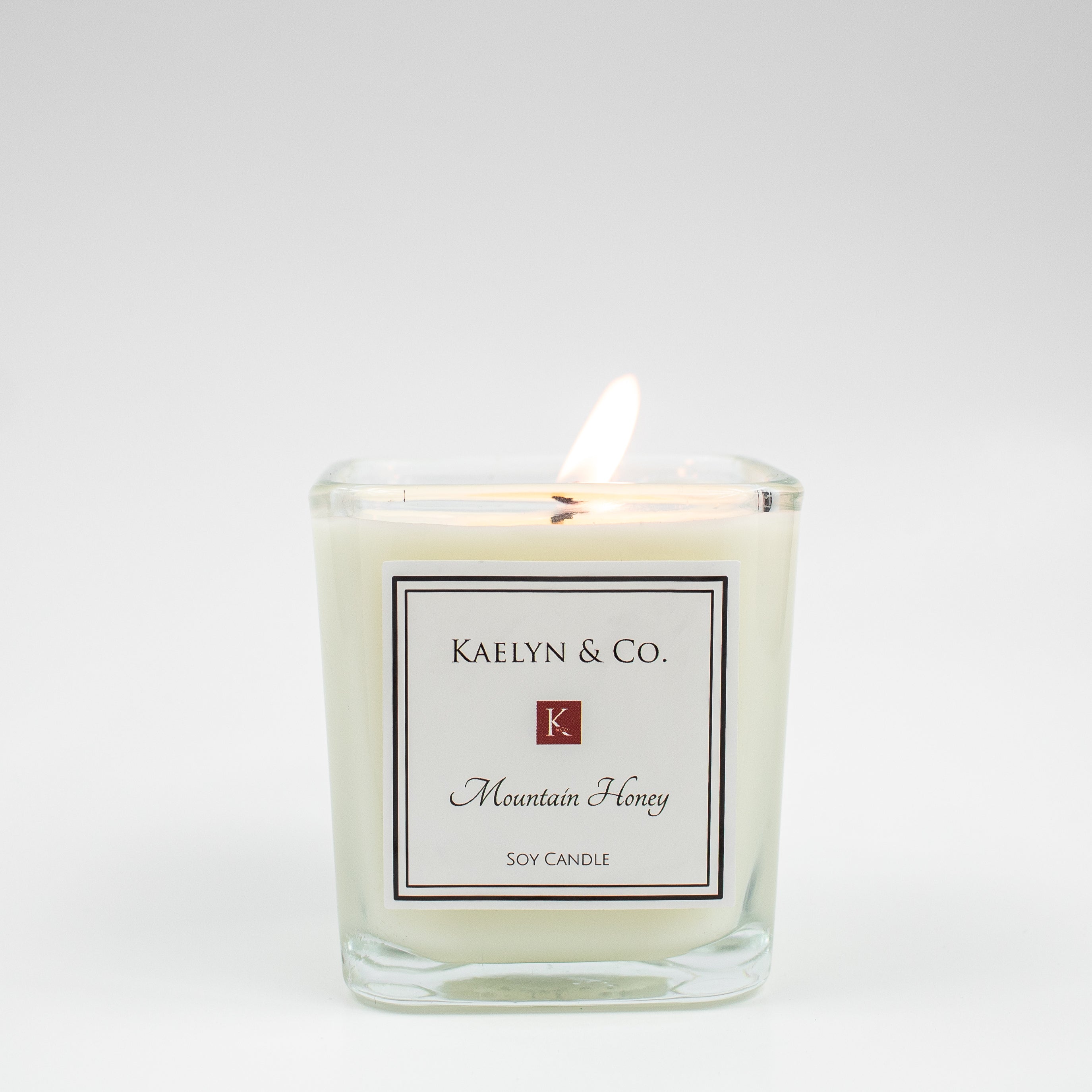 Mountain Honey Small Cube Candle in elegant cube shape, showcasing its natural soy wax and honey floral scent.