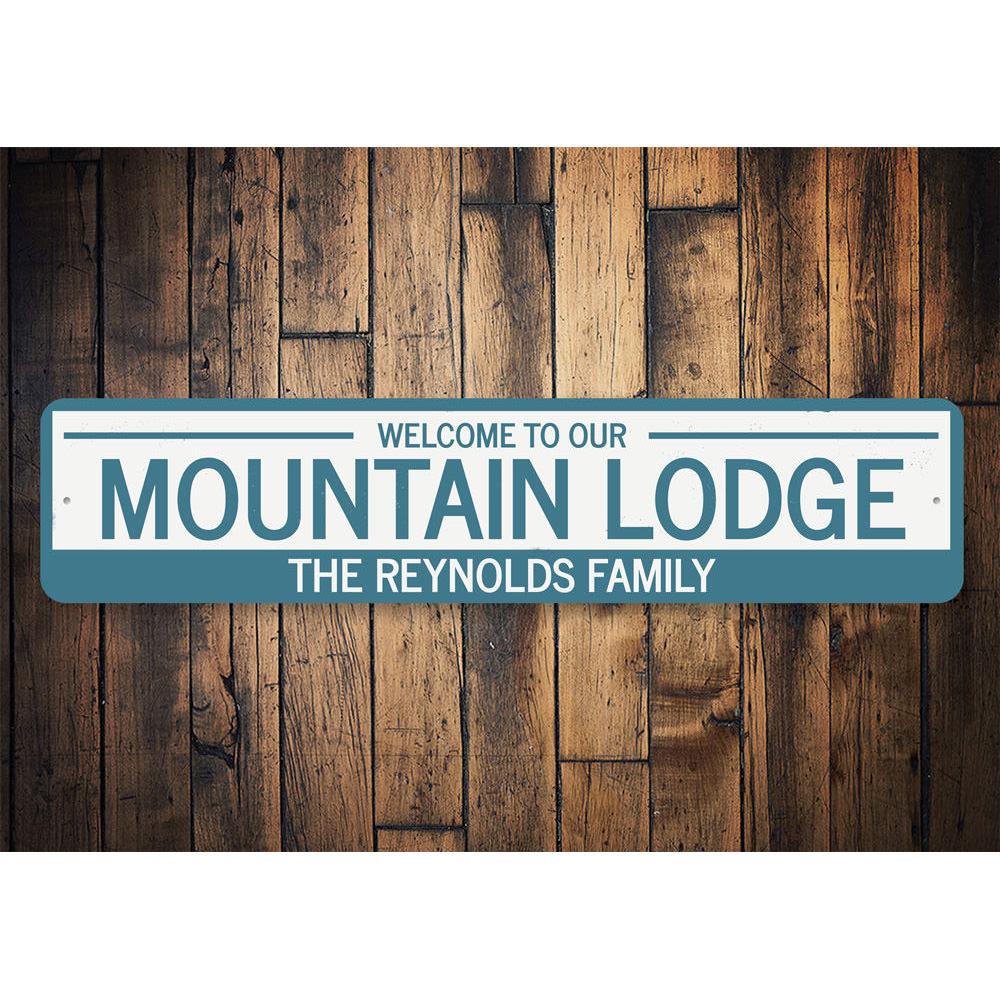 Mountain Lodge Welcome Sign made of aluminum, featuring customizable text and pre-drilled holes for easy mounting, ideal for ski enthusiasts.