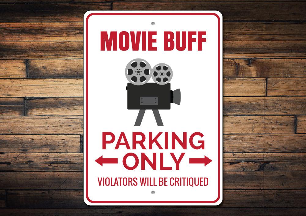 Movie Buff Parking Sign made of high-quality aluminum, featuring a creative design for movie enthusiasts, perfect for indoor or outdoor use.