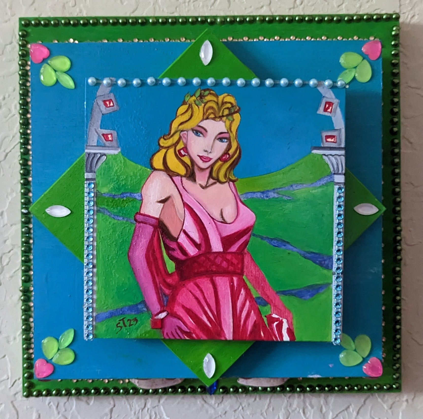 A beautifully hand-decorated Wish Box by Sharon Tatem featuring a powerful maiden, showcasing intricate designs and vibrant colors.