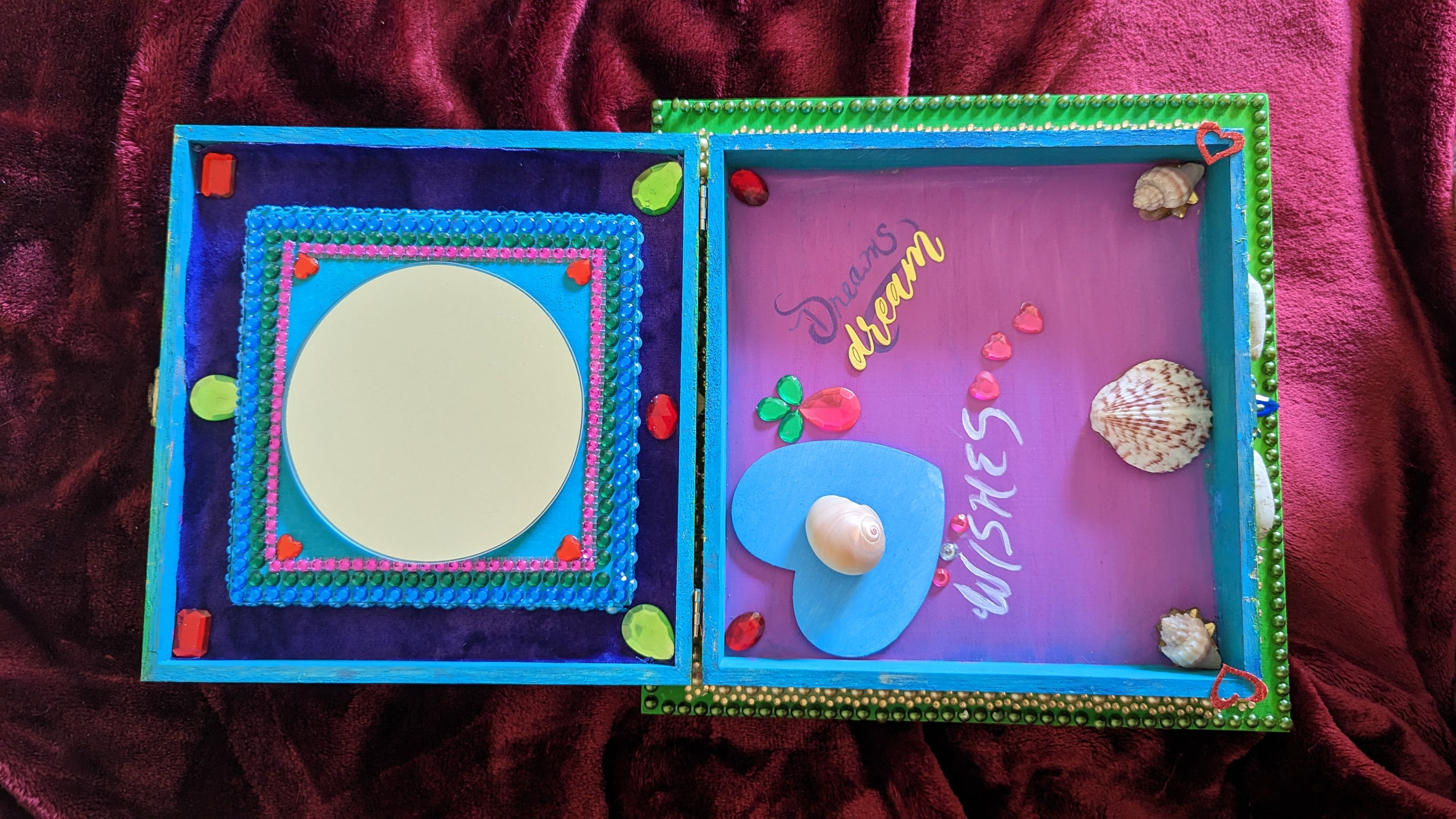 A beautifully hand-decorated Wish Box by Sharon Tatem featuring a powerful maiden, showcasing intricate designs and vibrant colors.