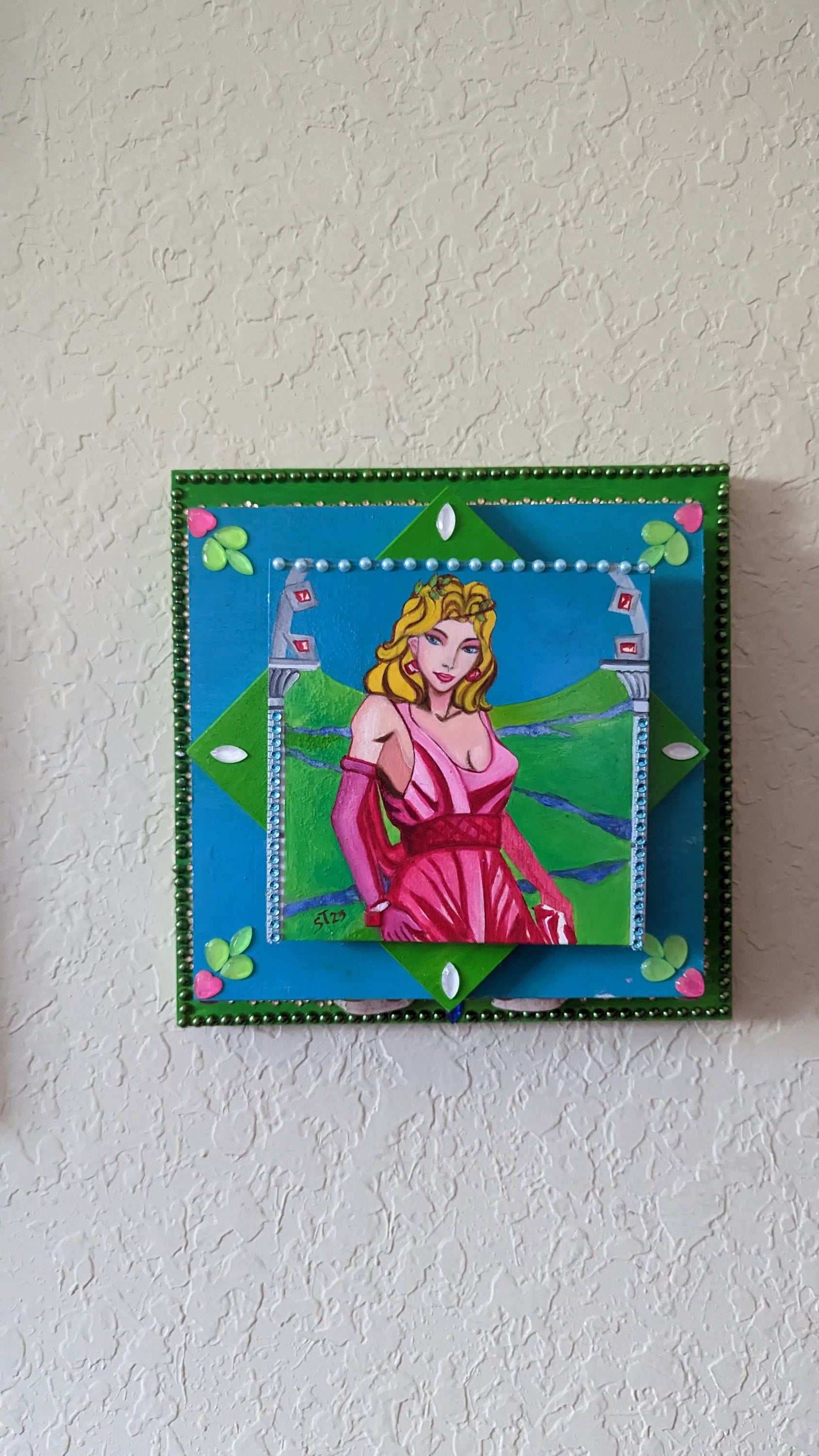 A beautifully hand-decorated Wish Box by Sharon Tatem featuring intricate designs and a powerful maiden, symbolizing dreams and wishes.