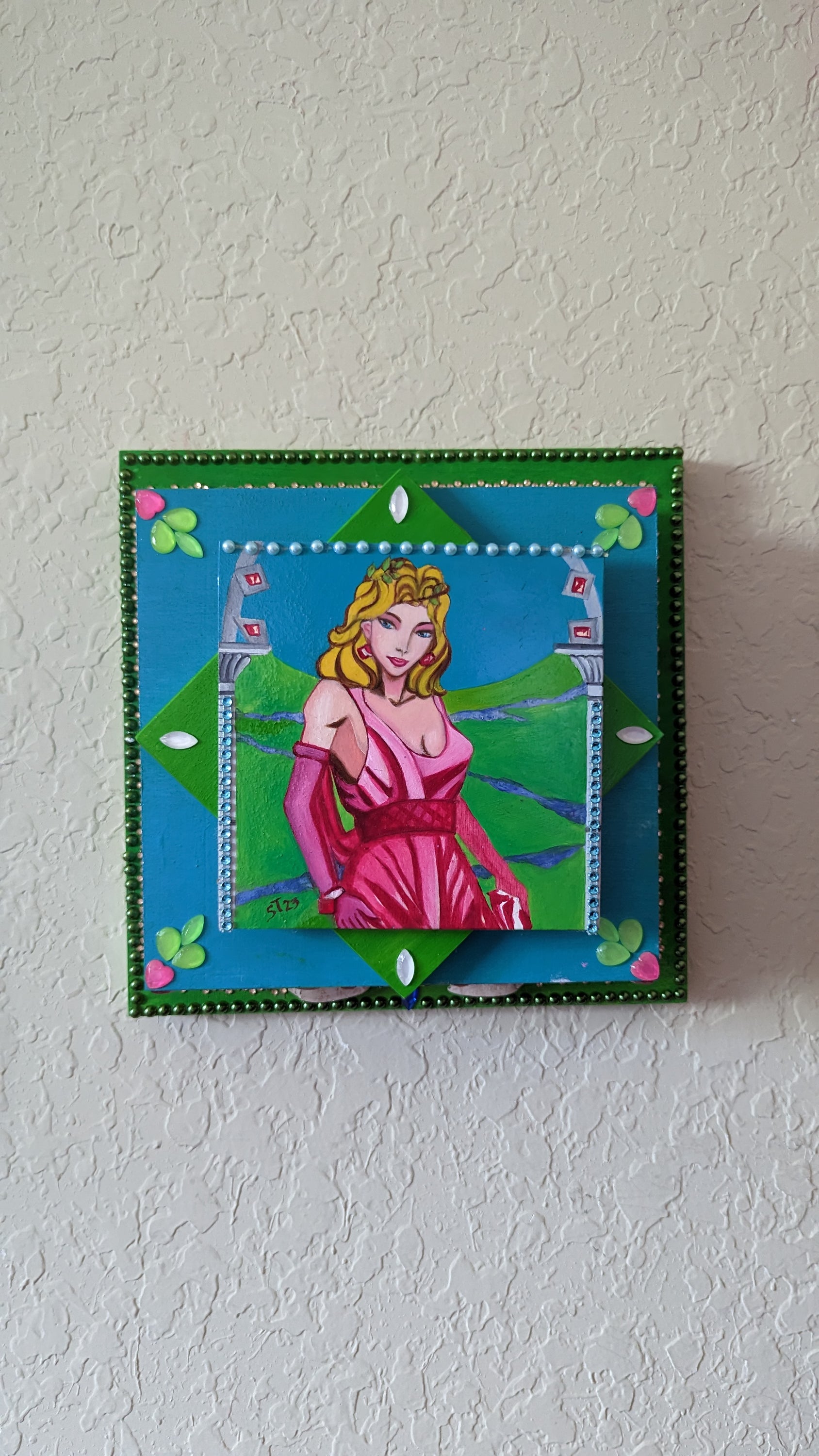 A beautifully hand-decorated Wish Box by Sharon Tatem featuring intricate designs and a powerful maiden, symbolizing dreams and wishes.