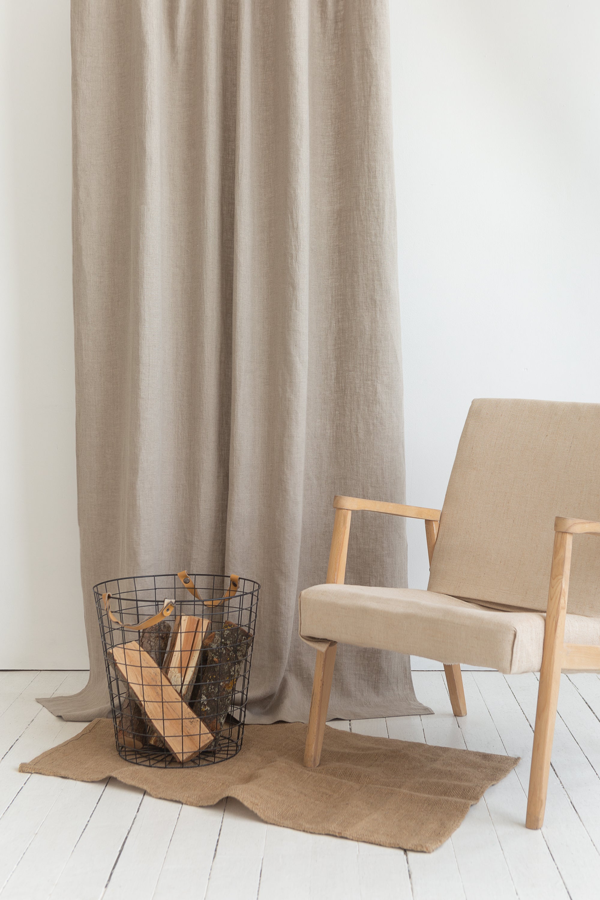 Elegant natural linen curtain with tie top design, showcasing soft texture and semi-sheer fabric.