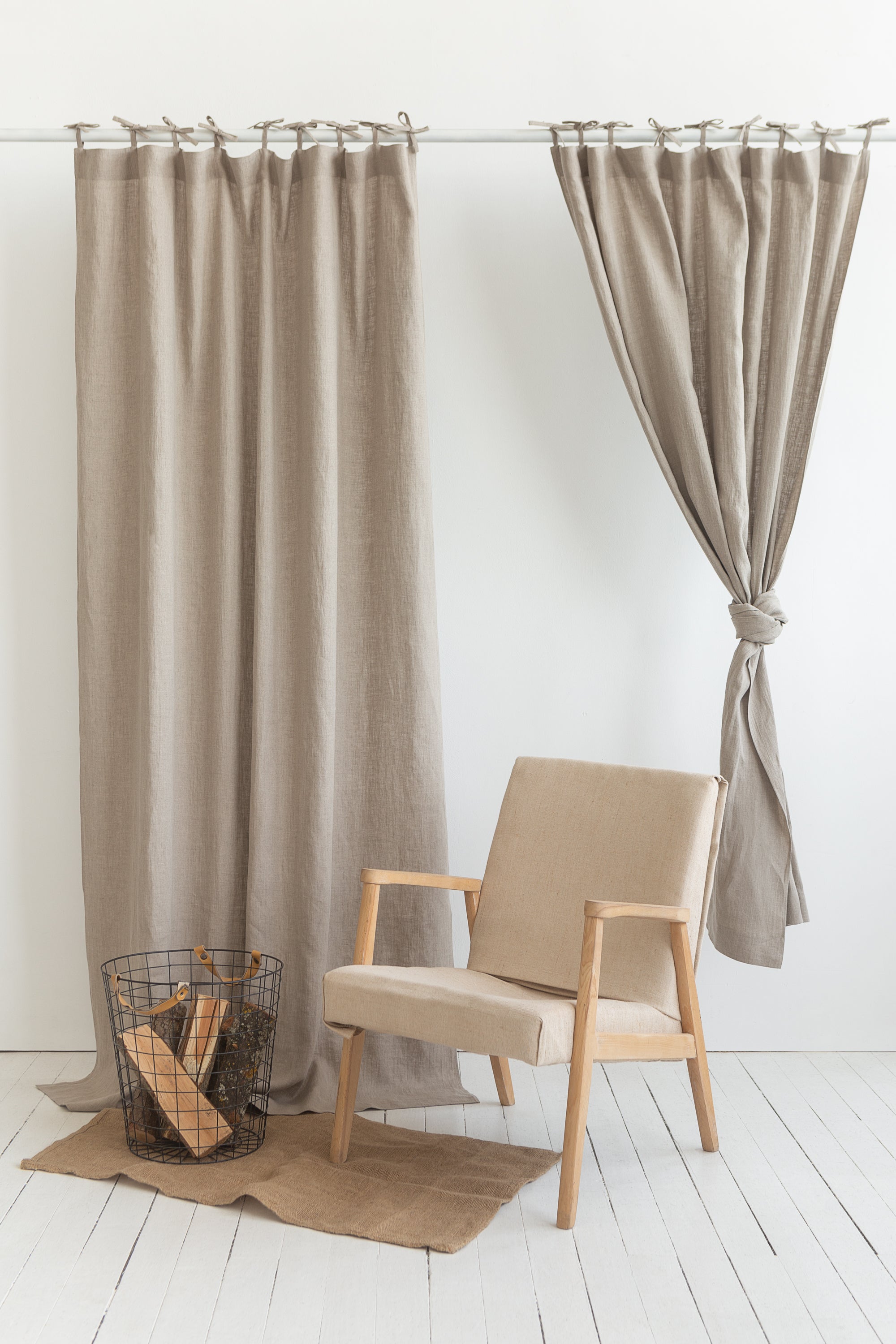 Elegant natural linen curtain with tie top design, showcasing soft texture and semi-sheer fabric.