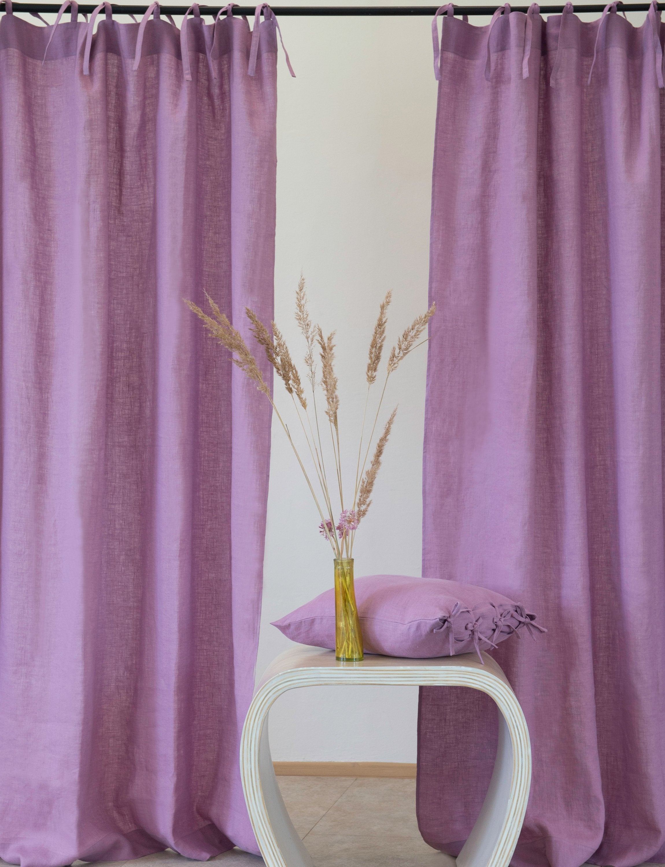 Elegant natural linen curtain with tie top design, showcasing soft texture and semi-sheer fabric.