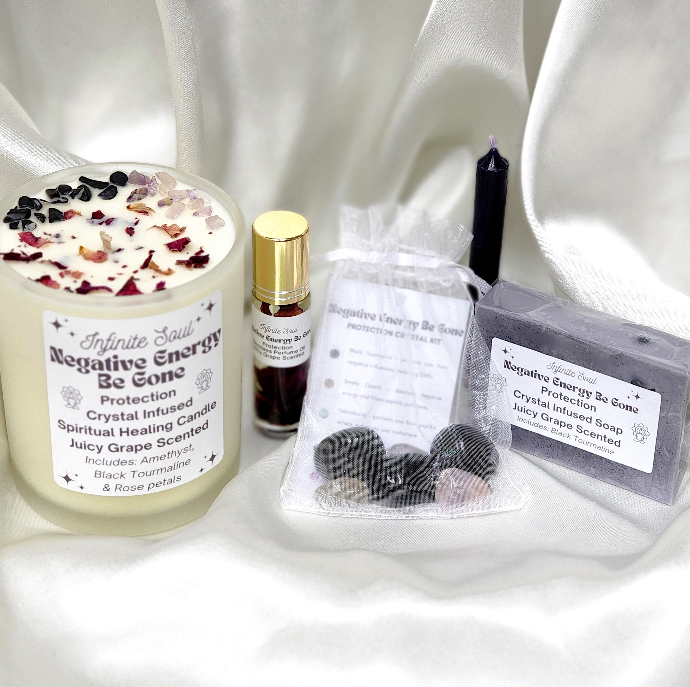 Negative Energy Be Gone Protection Bundle featuring candles, crystals, and oils for spiritual protection and manifestation.
