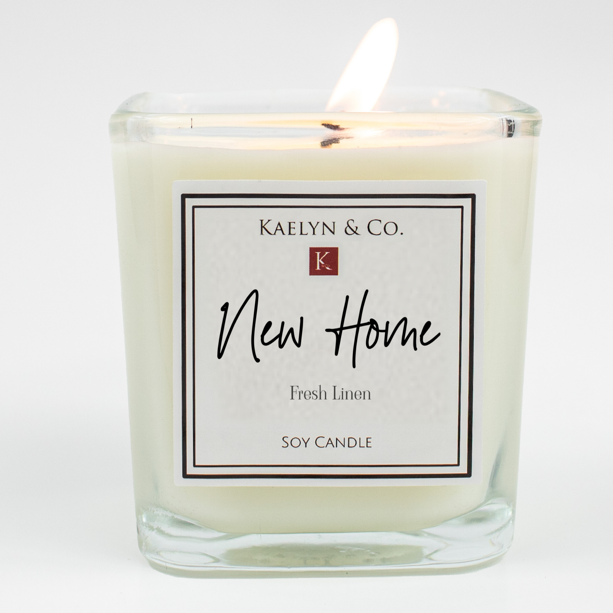 New Home Limited Edition Candle in decorative box, showcasing its elegant design and natural soy wax.