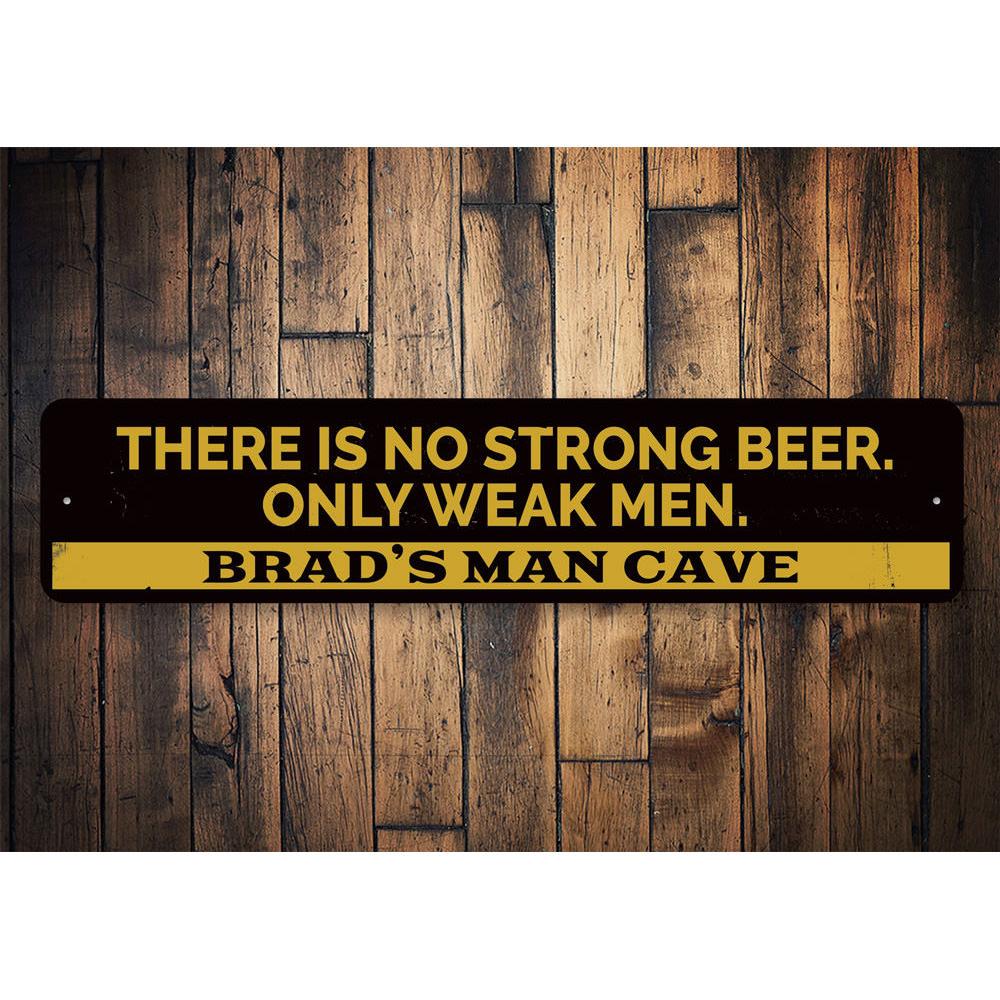 A humorous metal sign reading 'No Strong Beer Only Weak Men', perfect for man caves and home bars, showcasing quality craftsmanship.