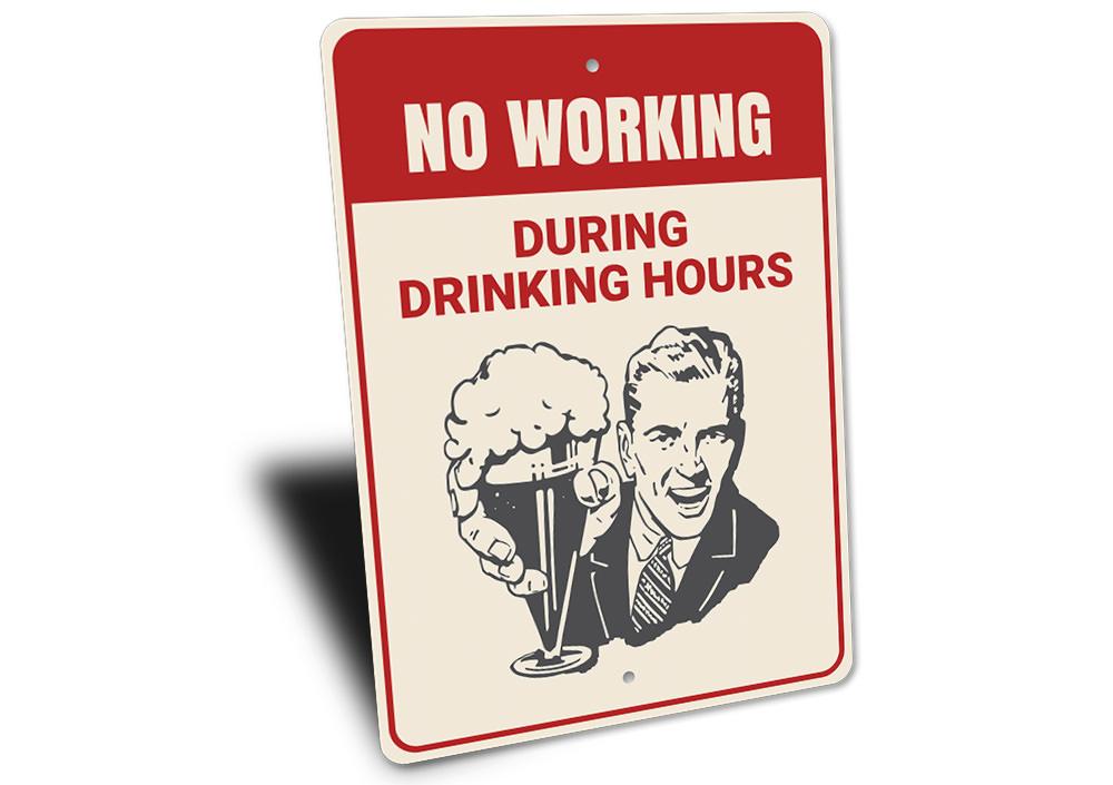 No Working During Drinking Hours Sign made of high-quality aluminum, featuring humorous text, ideal for home bars and man caves.