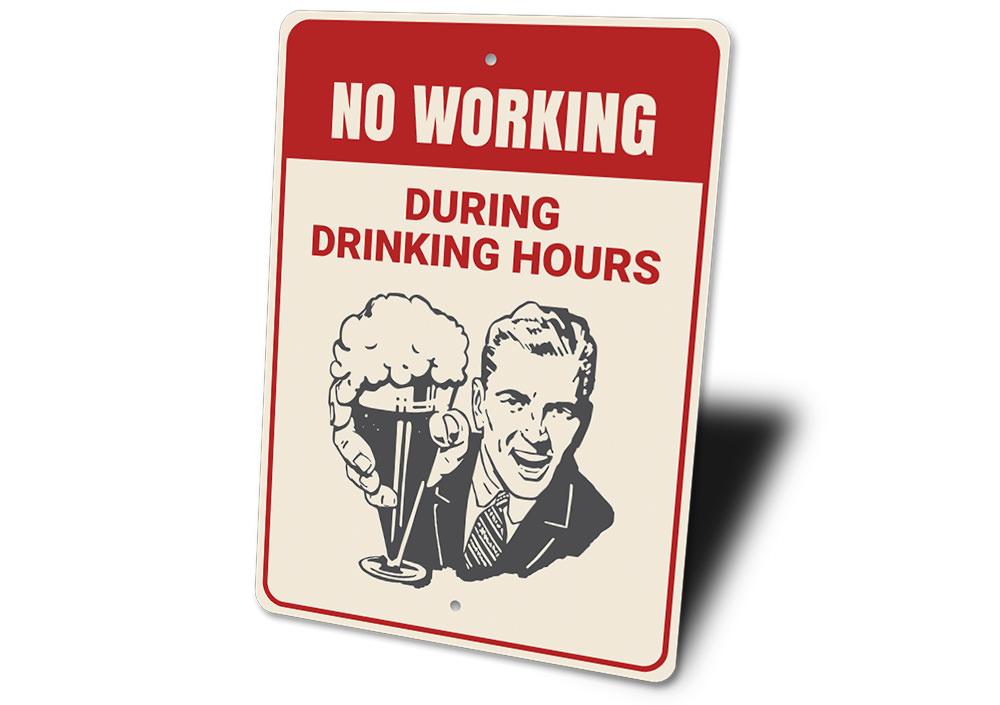 No Working During Drinking Hours Sign made of high-quality aluminum, featuring humorous text, ideal for home bars and man caves.
