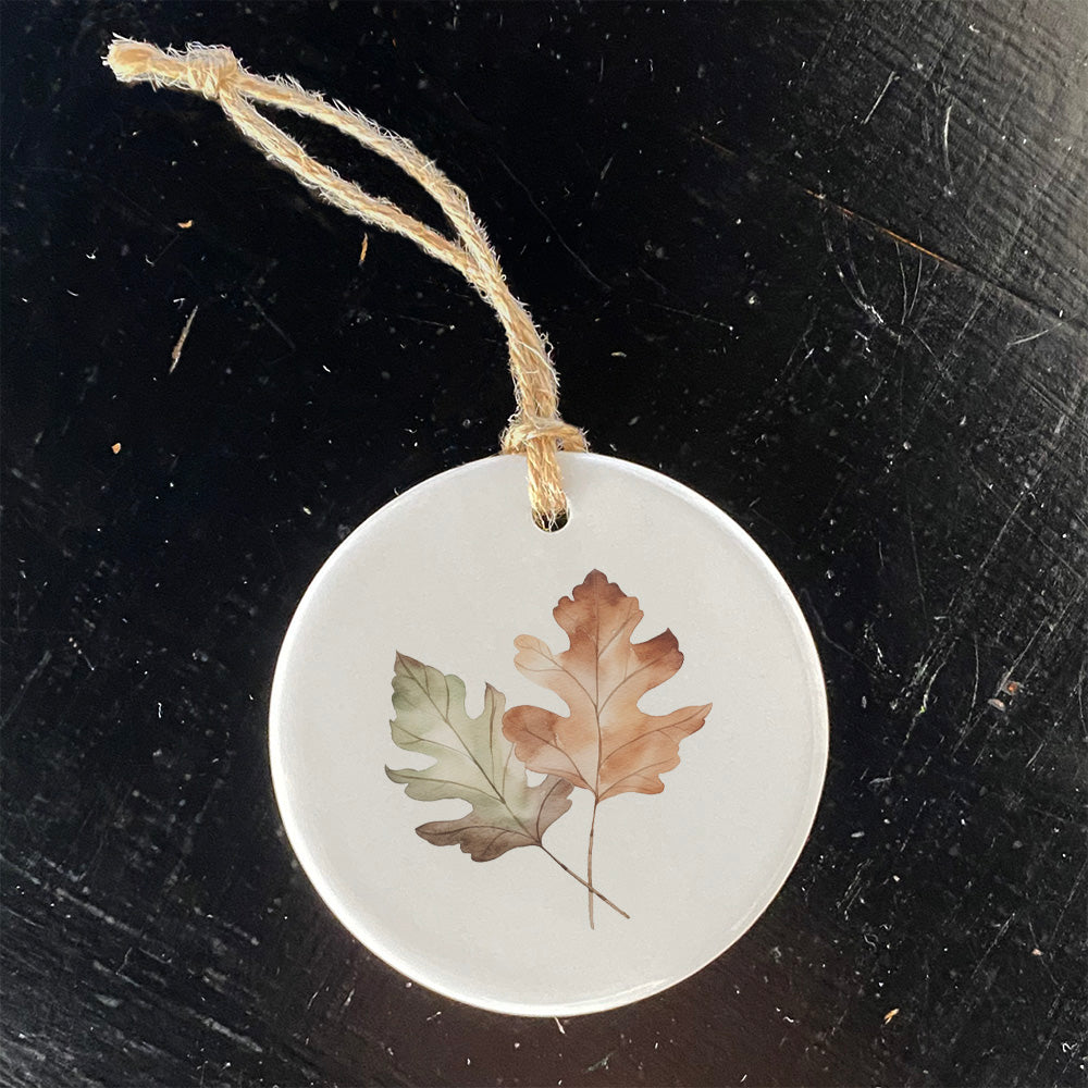 A beautifully crafted Oak Leaves Ornament made of high-quality porcelain, featuring a vibrant design and smooth gloss finish.