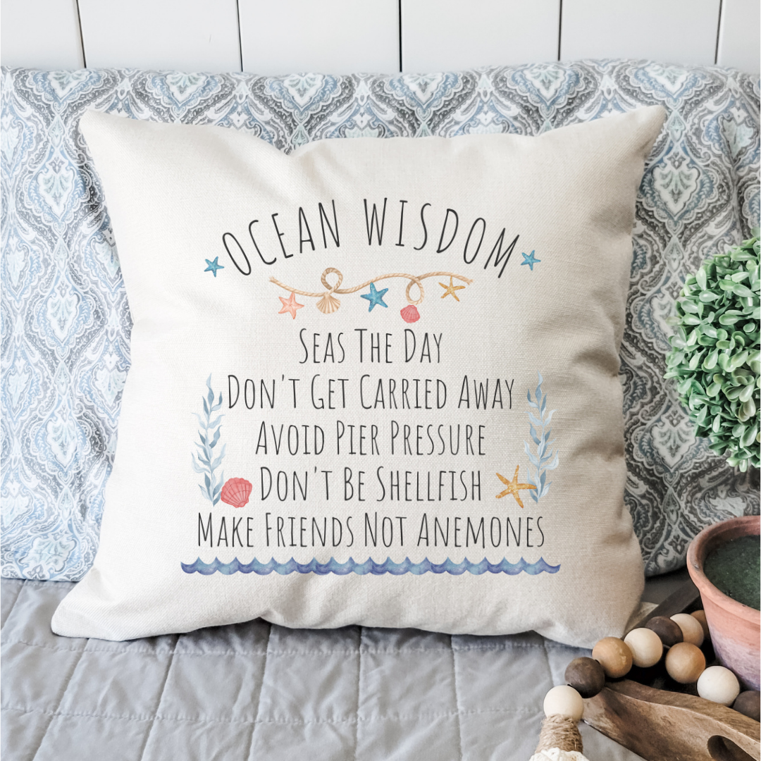 Ocean Wisdom Pillow Cover featuring original ocean-themed designs on soft linen fabric, with a hidden zipper and light beige base color.