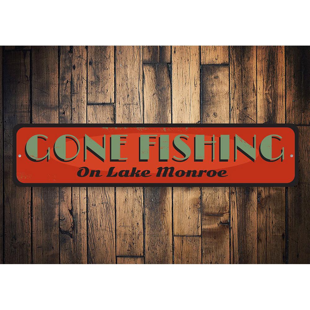 Old Gone Fishing Sign made of durable aluminum, featuring a rustic design perfect for lakehouse decor.