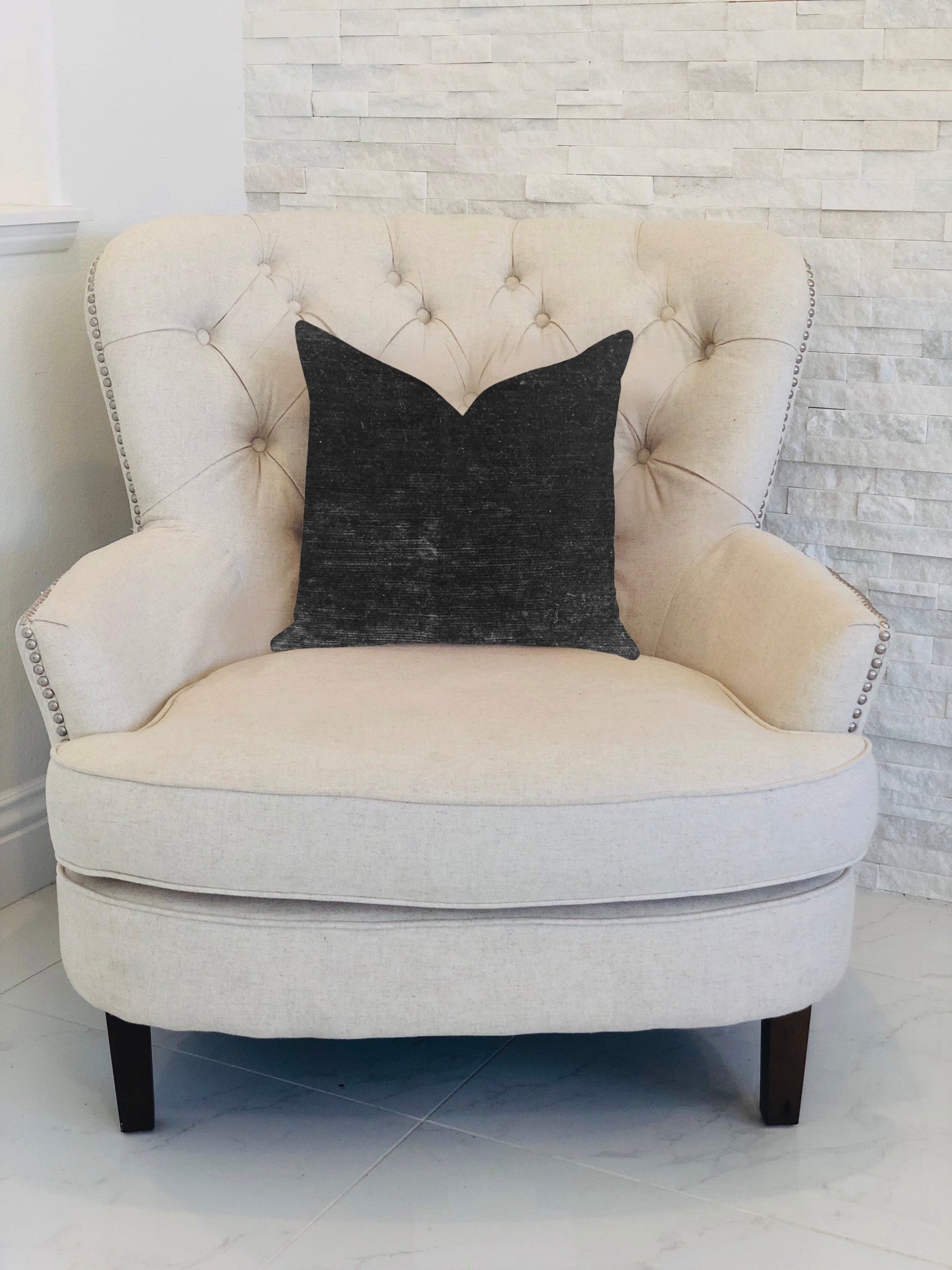 Onyx Caviar Velvet Throw Pillow in Black, showcasing luxurious fabric and elegant design with invisible zipper.