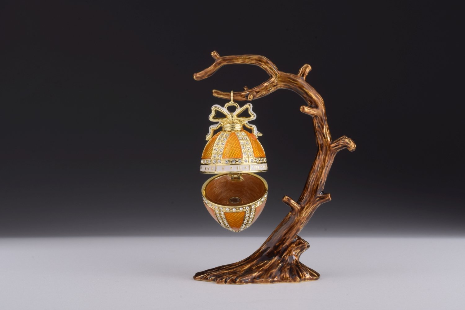 Orange Russian Egg Hanging trinket box with Austrian crystals, handmade by Keren Kopal, featuring 24K gold plating and a secure magnetic closure.