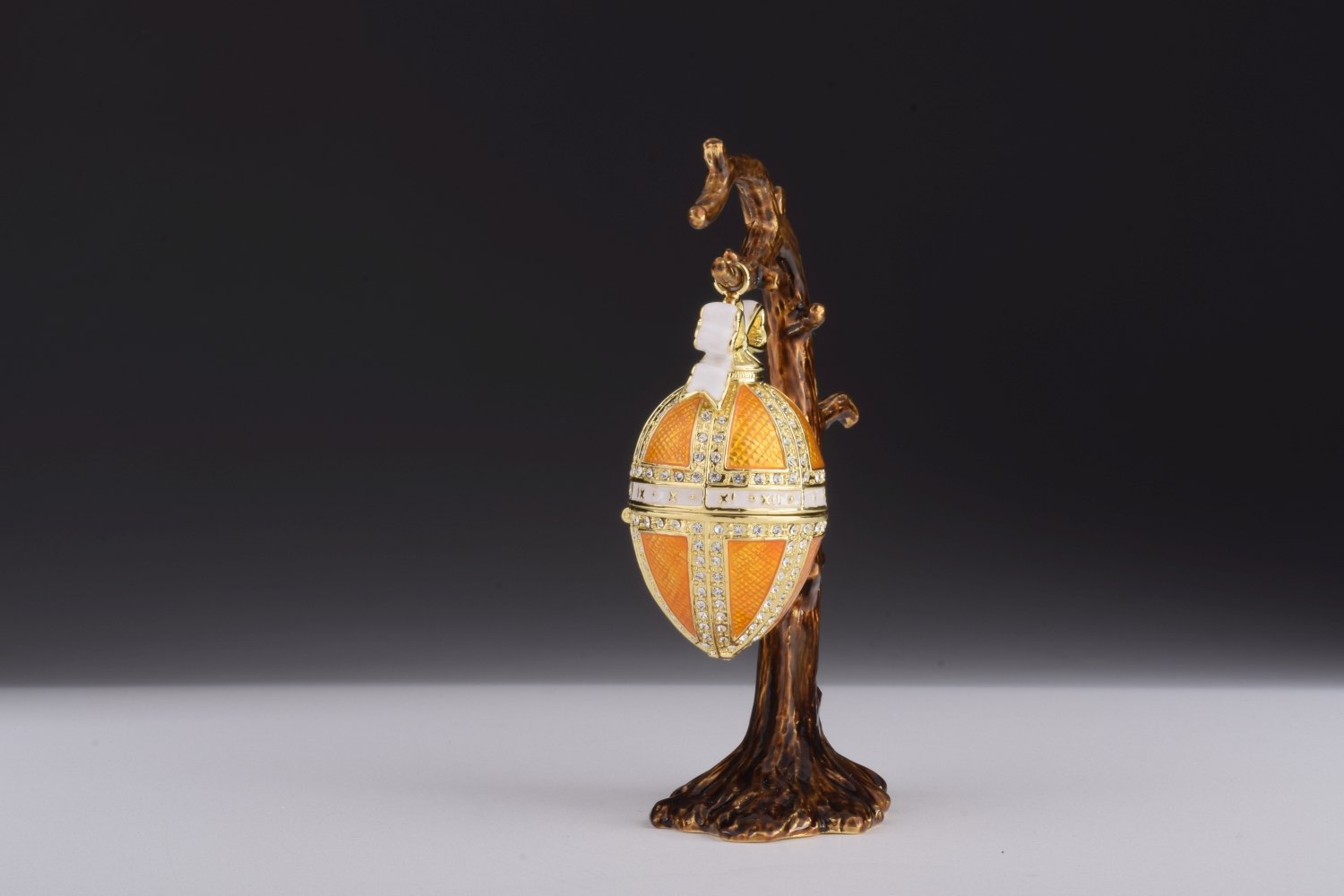 Orange Russian Egg Hanging trinket box with Austrian crystals, handmade by Keren Kopal, featuring 24K gold plating and a secure magnetic closure.