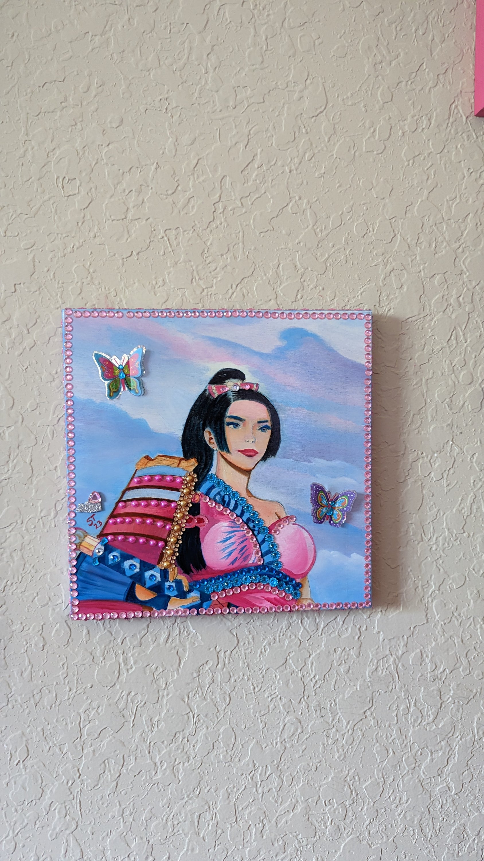 A beautifully hand-decorated Wish Box by Sharon Tatem, featuring intricate designs and a powerful maiden, symbolizing dreams and aspirations.