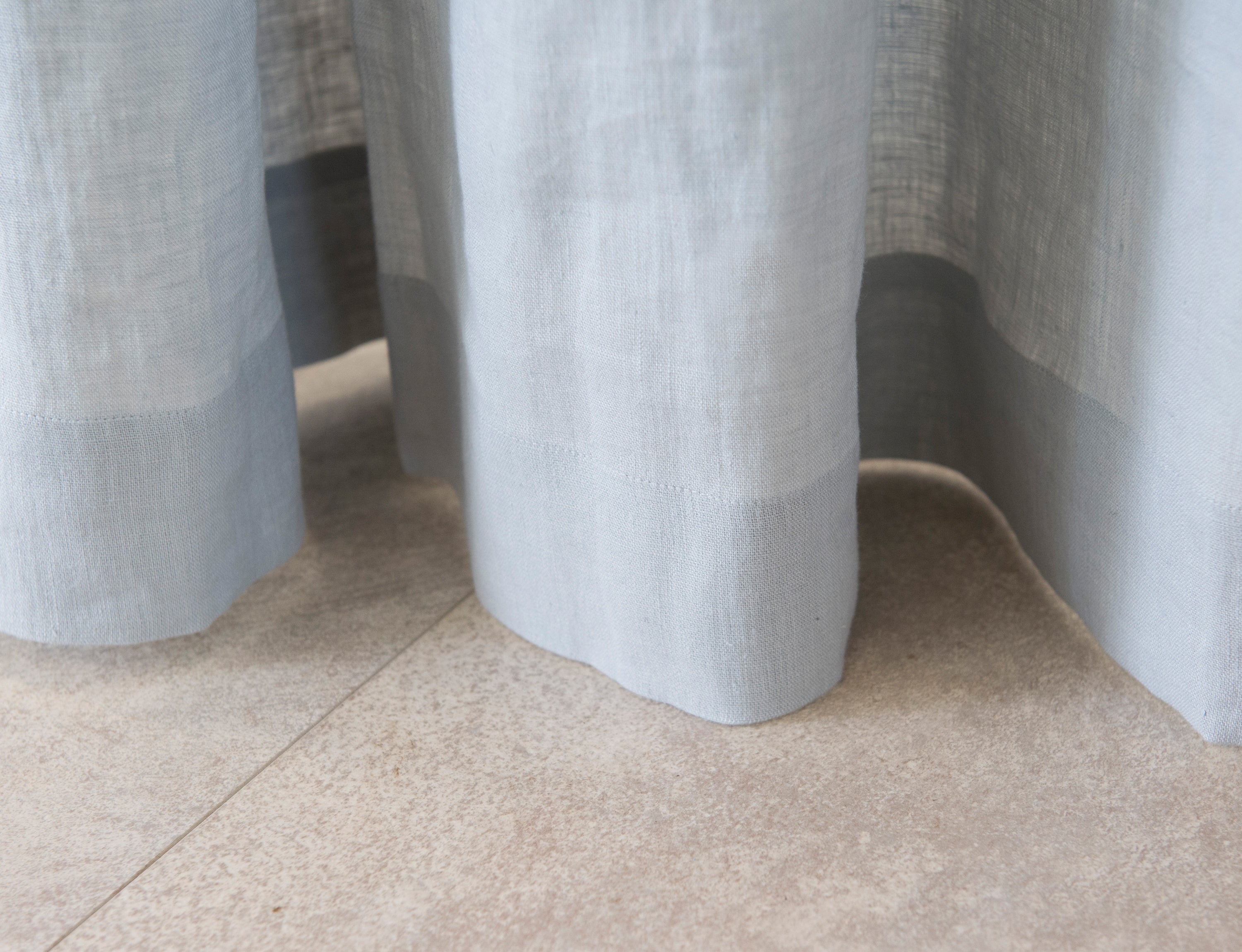 Pastel Plum linen curtain with multifunctional heading tape, elegantly draped to showcase its soft texture and color.