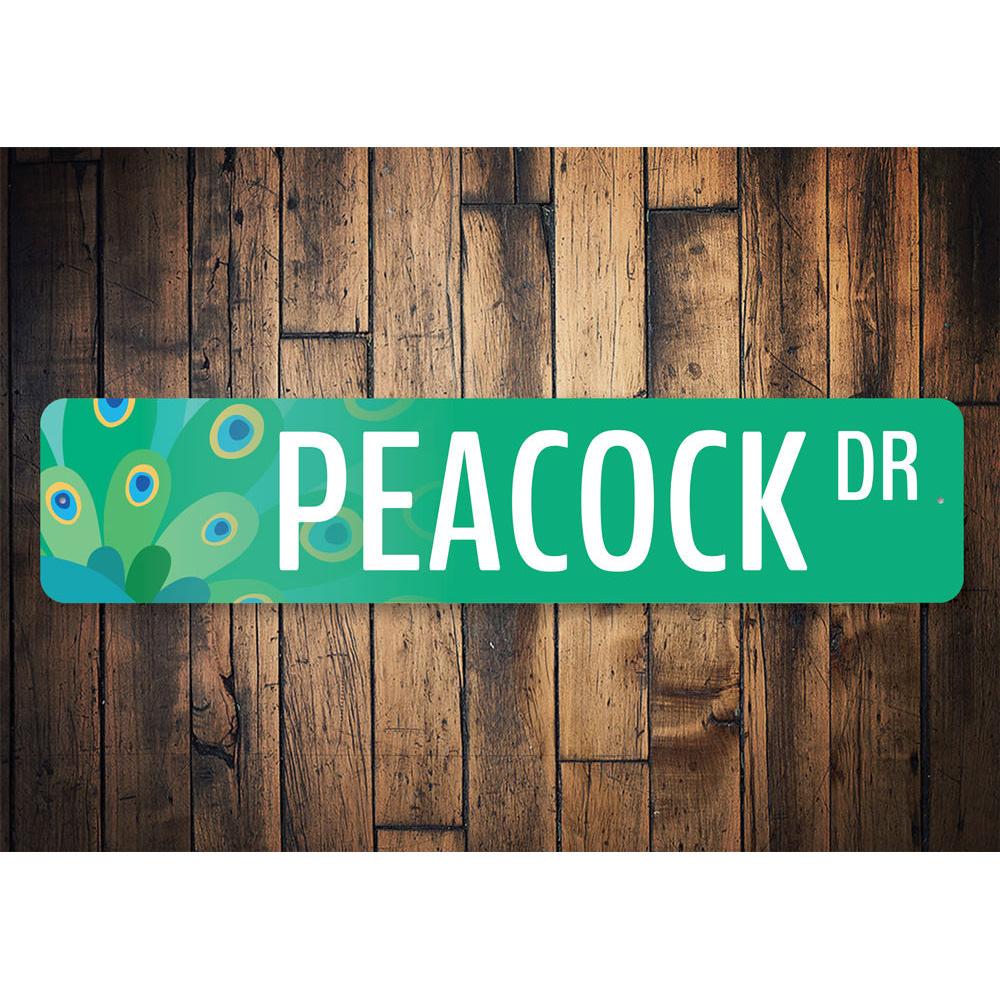 A vibrant Peacock Street Sign made of high-quality aluminum, featuring customizable text options, perfect for home decor.