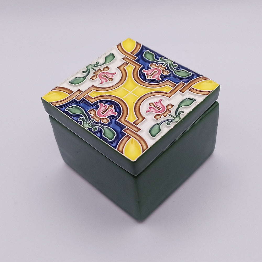 A beautifully handcrafted Peniche Ceramic Box featuring intricate designs and vibrant colors, perfect for home decor.