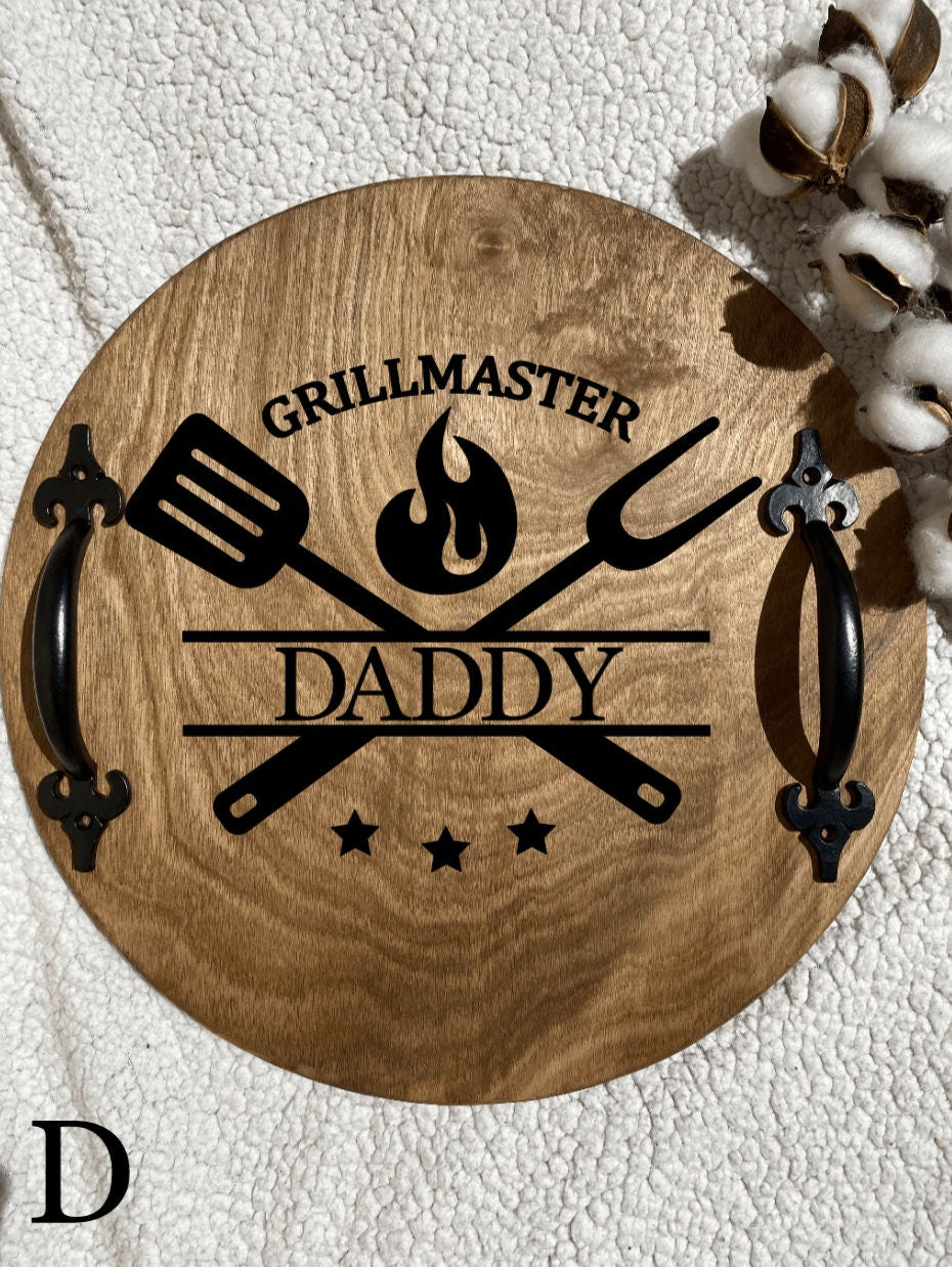 Personalized wooden grilling tray with dark chestnut finish and black metal handles, featuring custom name burned into the wood.
