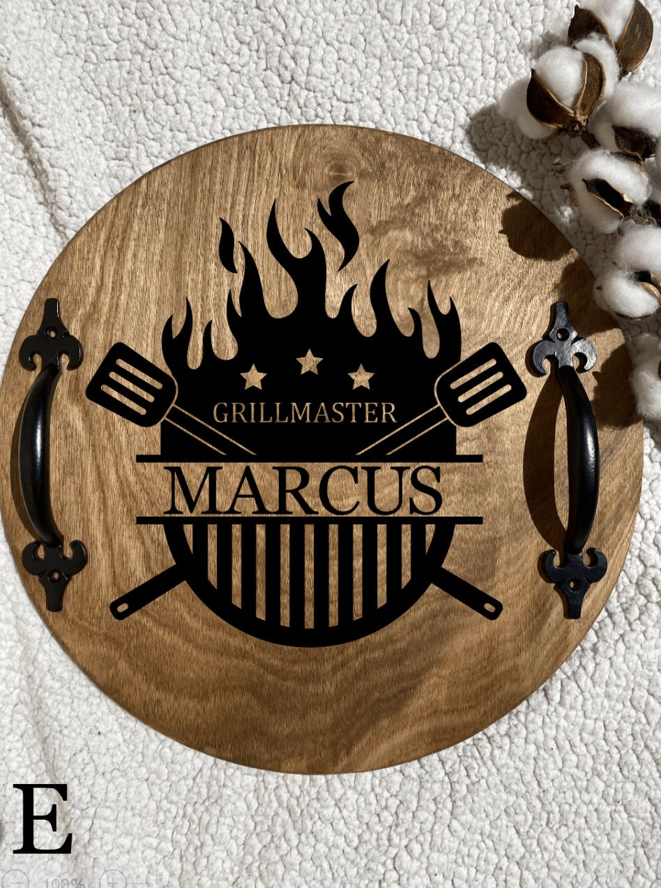 Personalized wooden grilling tray with dark chestnut finish and black metal handles, featuring custom name burned into the wood.
