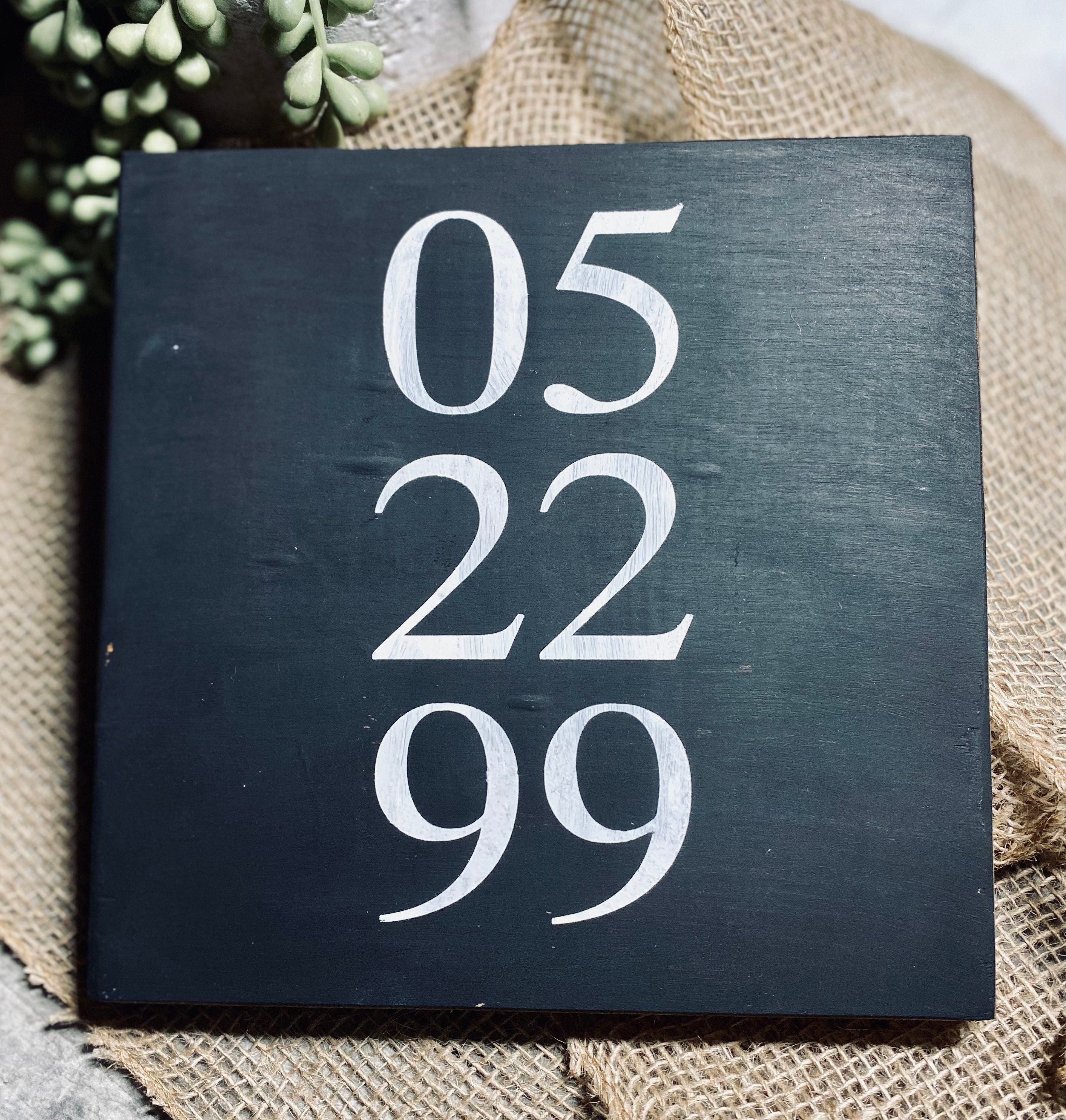 A beautifully crafted Personalized Important Date Wooden Sign made of solid pine, featuring customizable dates in black and white color options.
