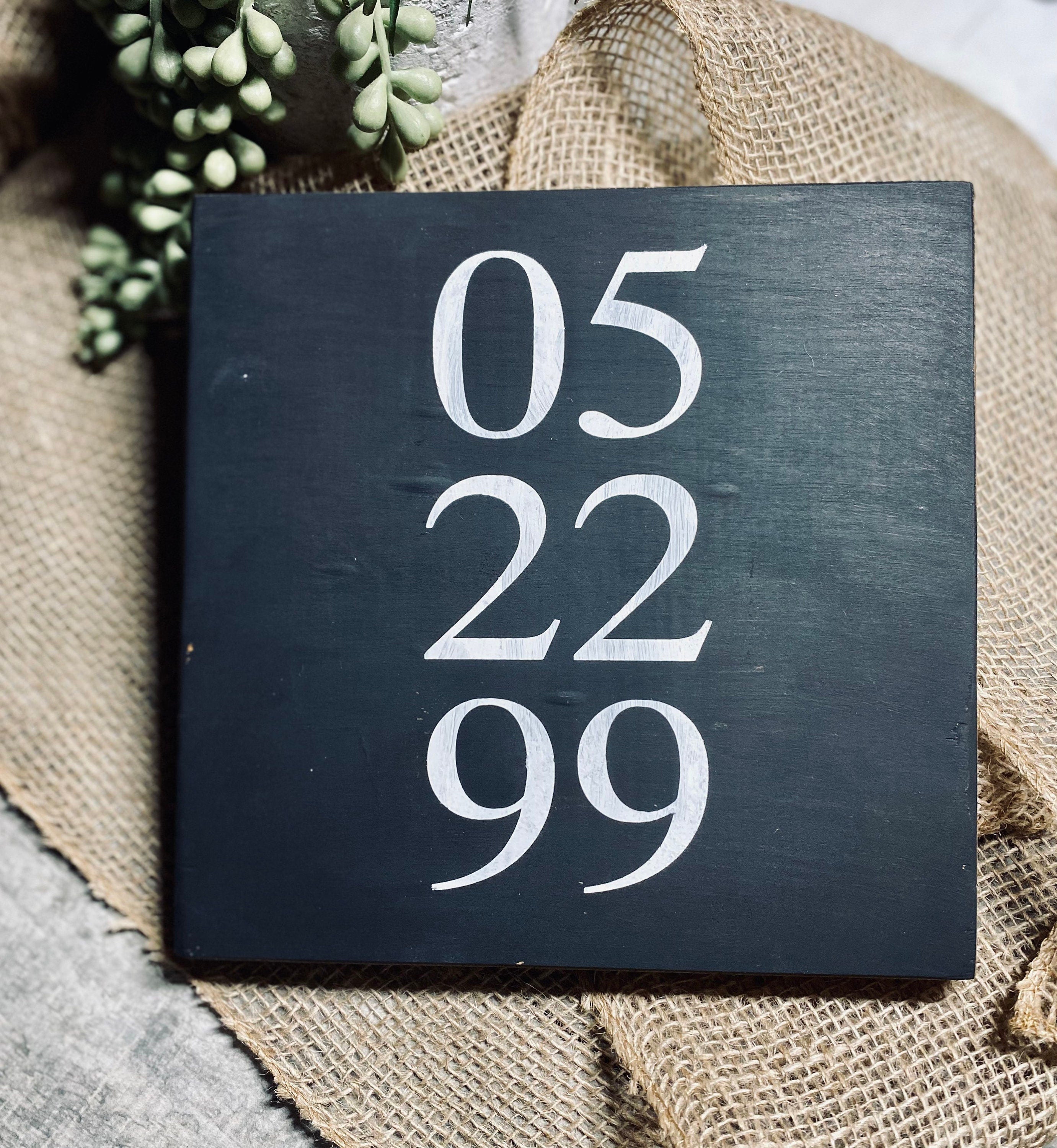 A beautifully crafted Personalized Important Date Wooden Sign made of solid pine, featuring customizable dates in black and white color options.