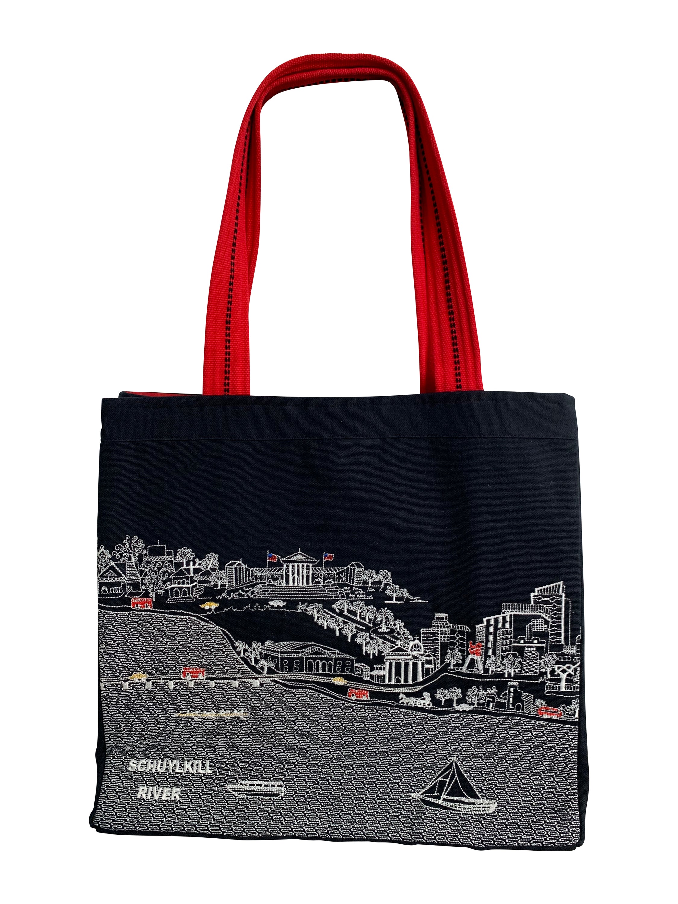 Stylish Philadelphia Tote Bag with embroidered skyline design in cream and black colors, featuring red waterproof lining and ribbed straps.