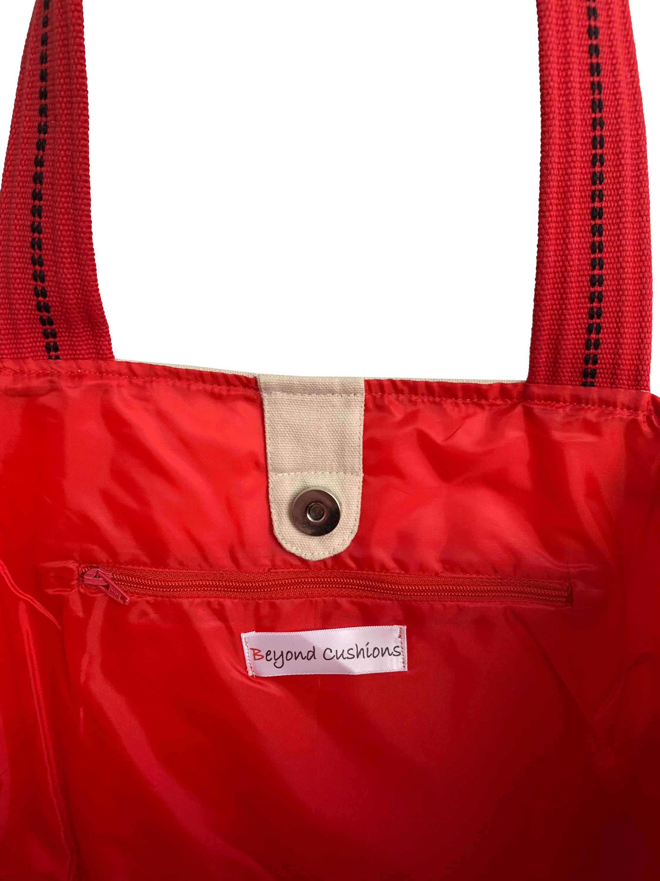 Stylish Philadelphia Tote Bag with embroidered skyline design in cream and black colors, featuring red waterproof lining and ribbed straps.
