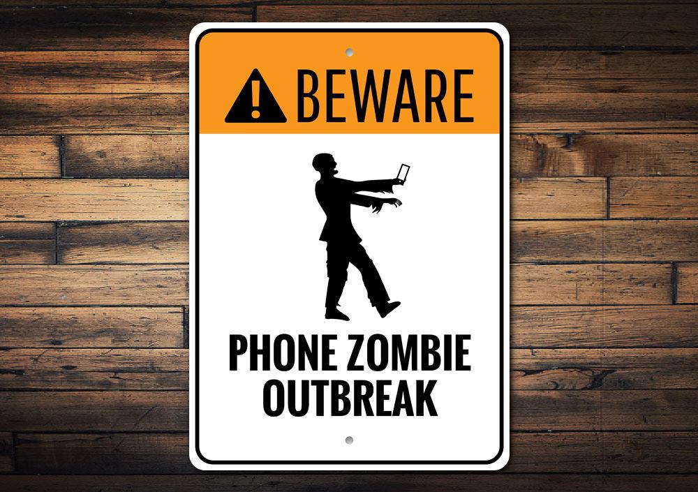 A colorful Phone Zombie Outbreak Sign made of durable aluminum, featuring a fun zombie design perfect for kids' rooms.