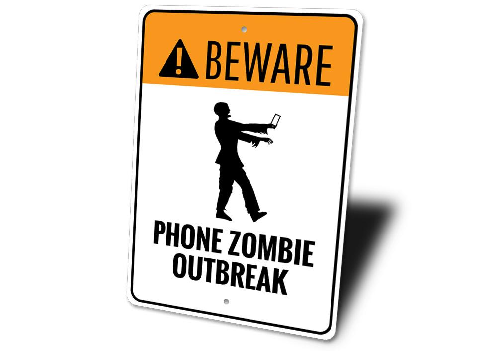 A colorful Phone Zombie Outbreak Sign made of durable aluminum, featuring a fun zombie design perfect for kids' rooms.