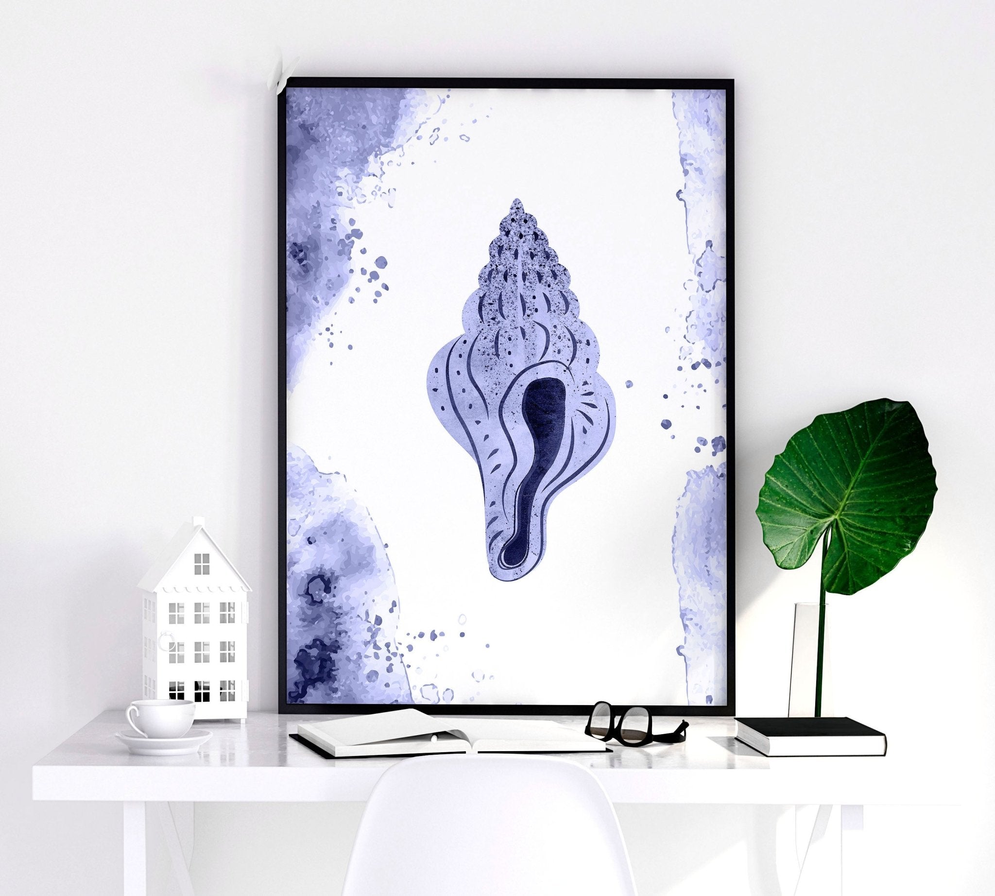 Set of 3 modern beach theme wall art prints featuring beautiful seashell illustrations in calming blue tones.