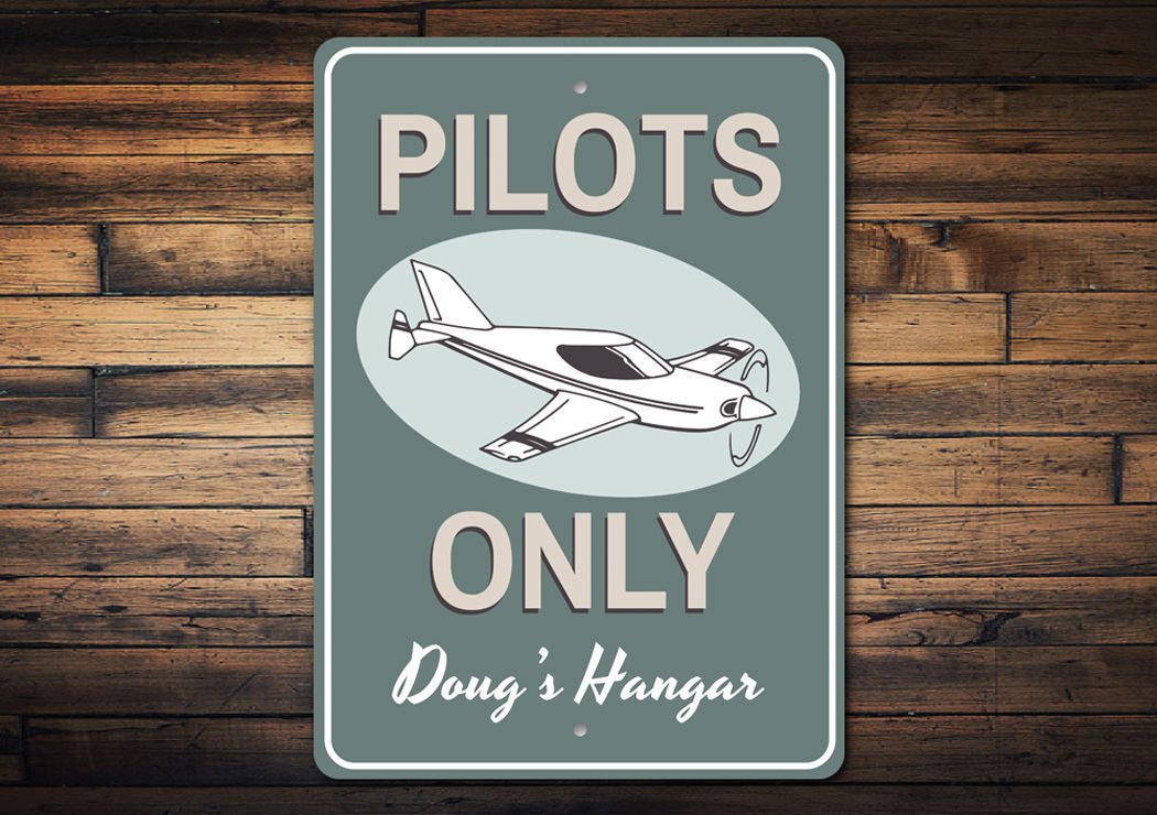 Pilots Only Hangar Sign made of high-quality aluminum, featuring customizable text and pre-drilled holes for easy mounting.