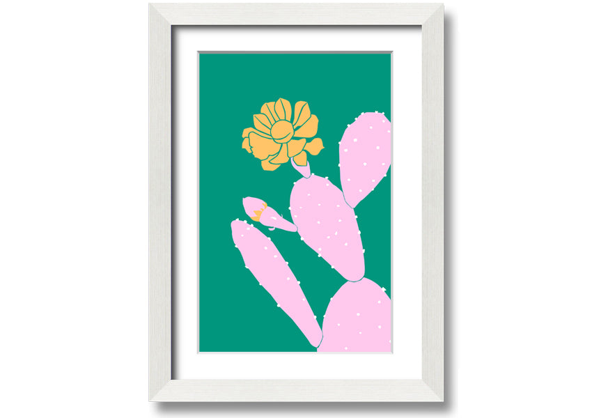A vibrant pink cactus with a bright yellow flower, beautifully framed, ready to hang.