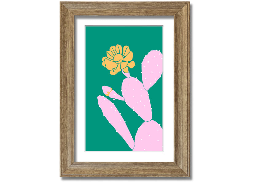 A vibrant pink cactus with a bright yellow flower, beautifully framed, ready to hang.