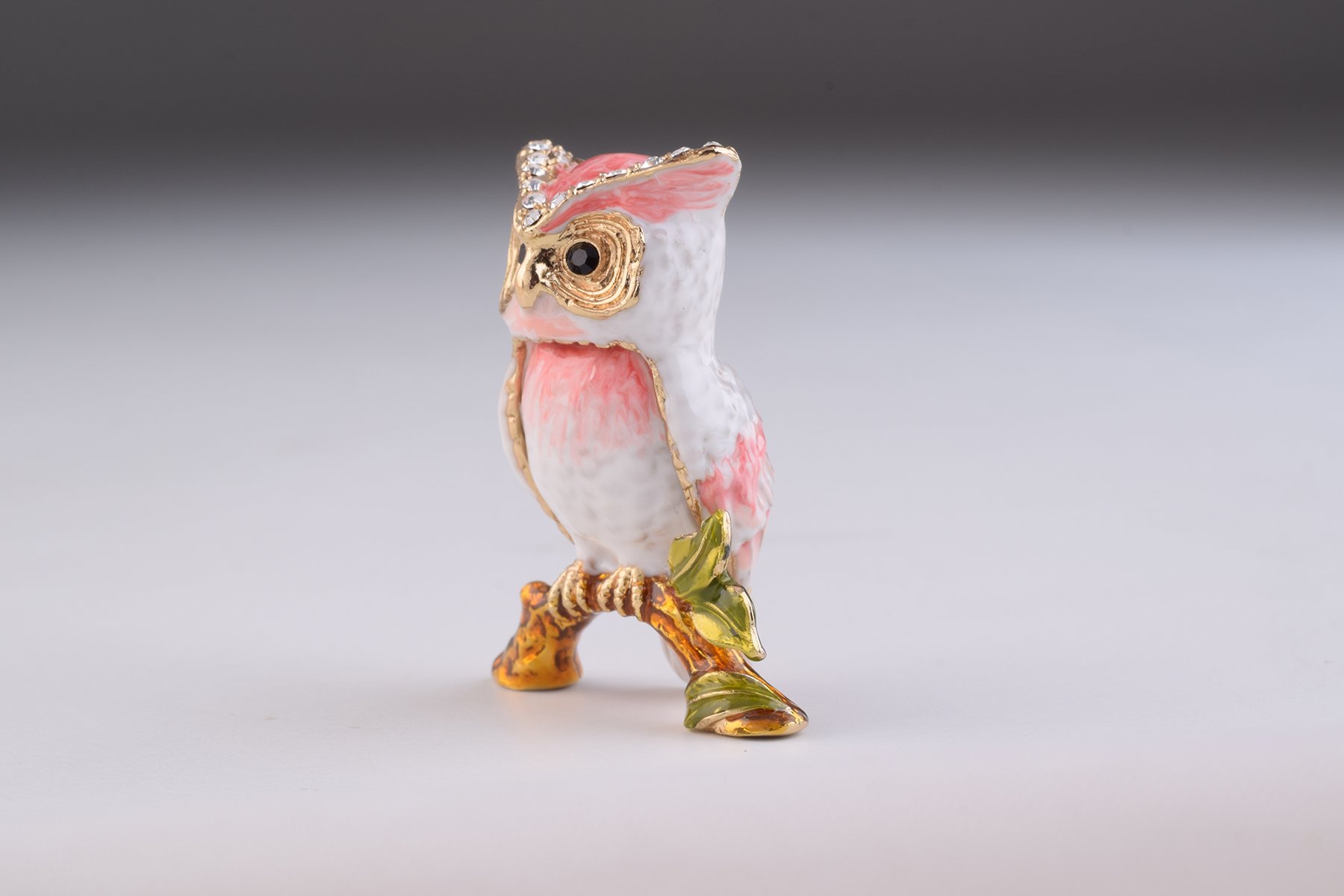 Handcrafted Pink Owl trinket box with Austrian crystals and gold plating, featuring a secure magnetic closure.