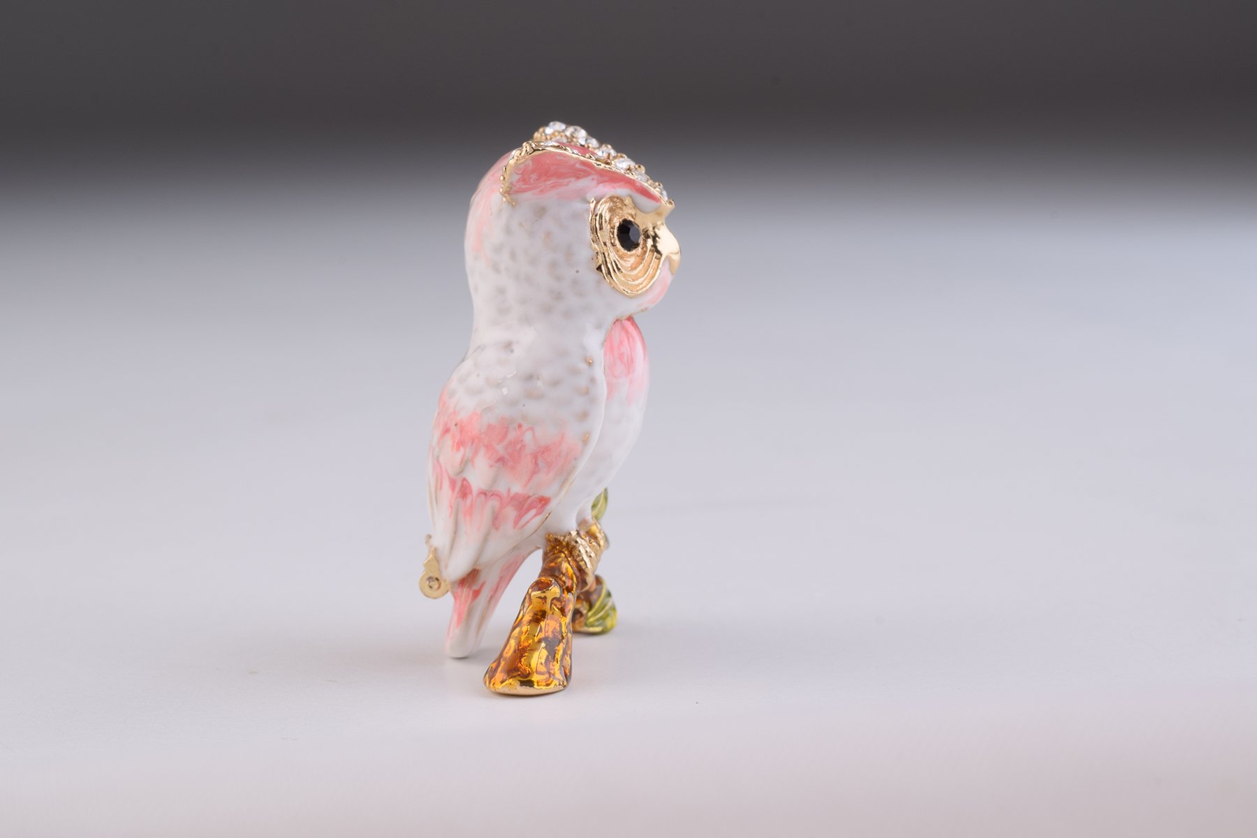 Handcrafted Pink Owl trinket box with Austrian crystals and gold plating, featuring a secure magnetic closure.