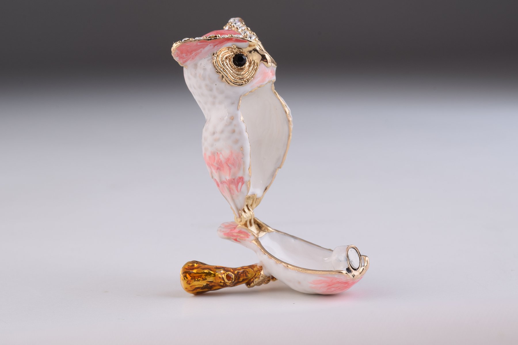 Handcrafted Pink Owl trinket box with Austrian crystals and gold plating, featuring a secure magnetic closure.